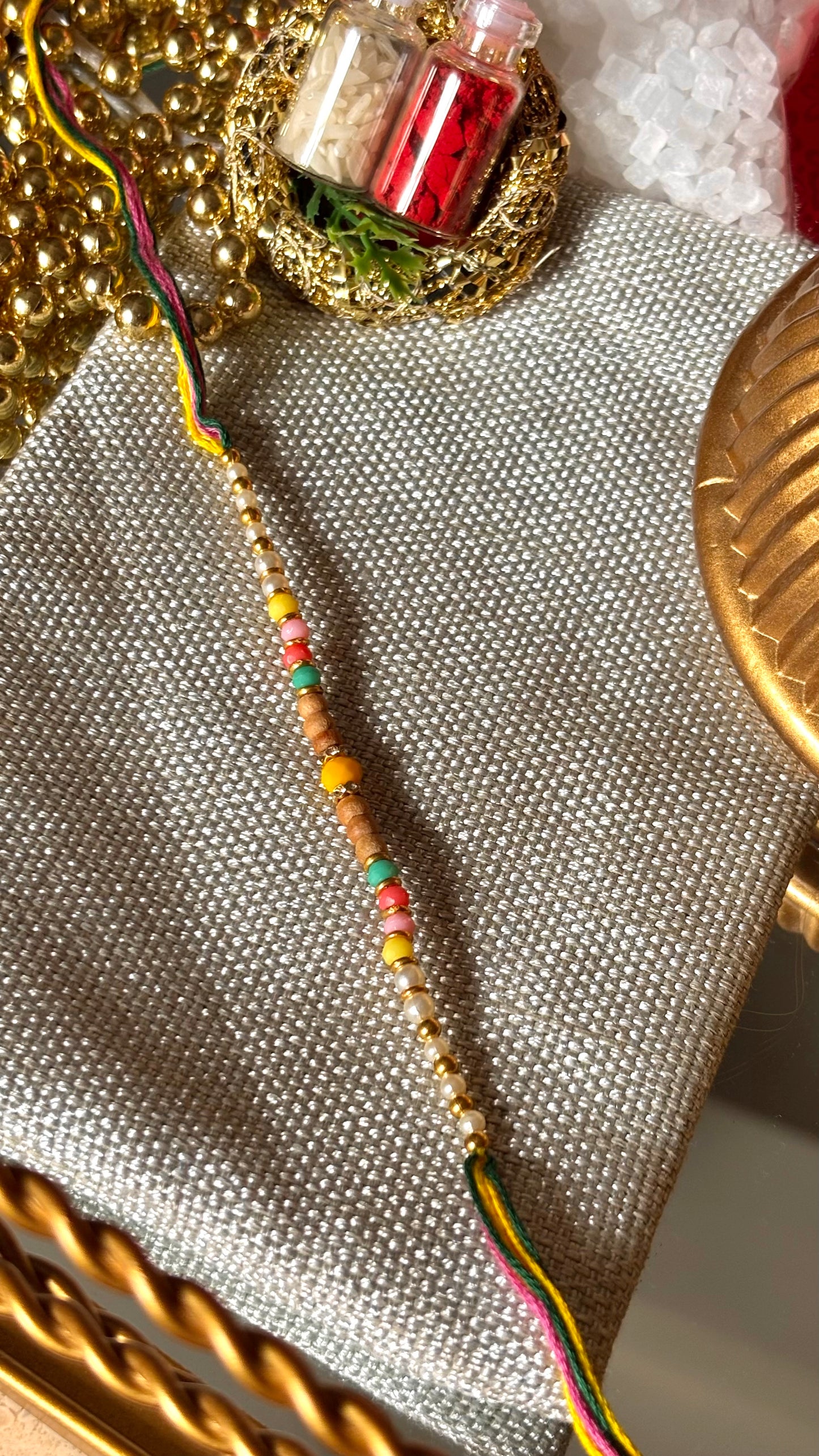 Multicoloured thread Rakhi ( shipping will be extra )
