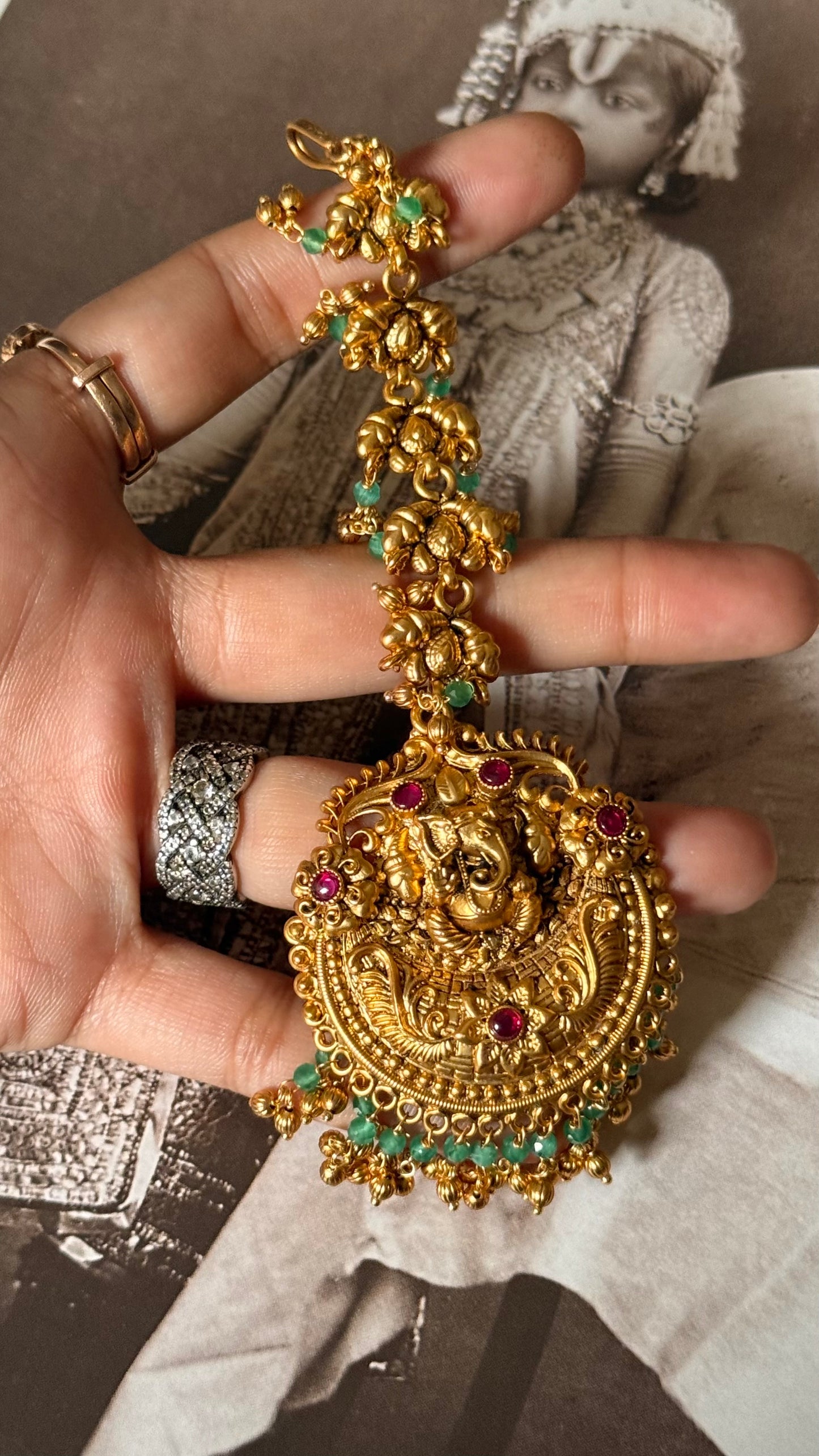 Lord ganesh rani pink & emerald maangtika