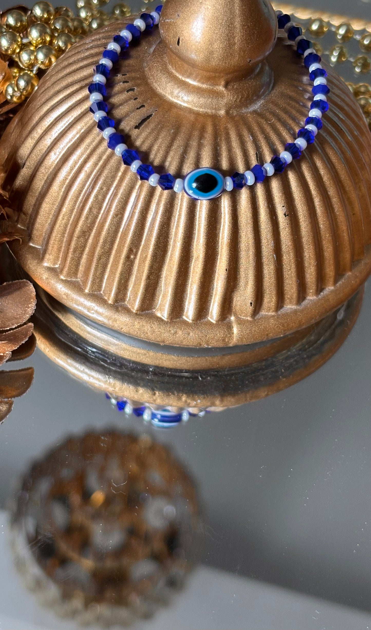 Evil eye sapphire rakhi ( shipping will be extra )