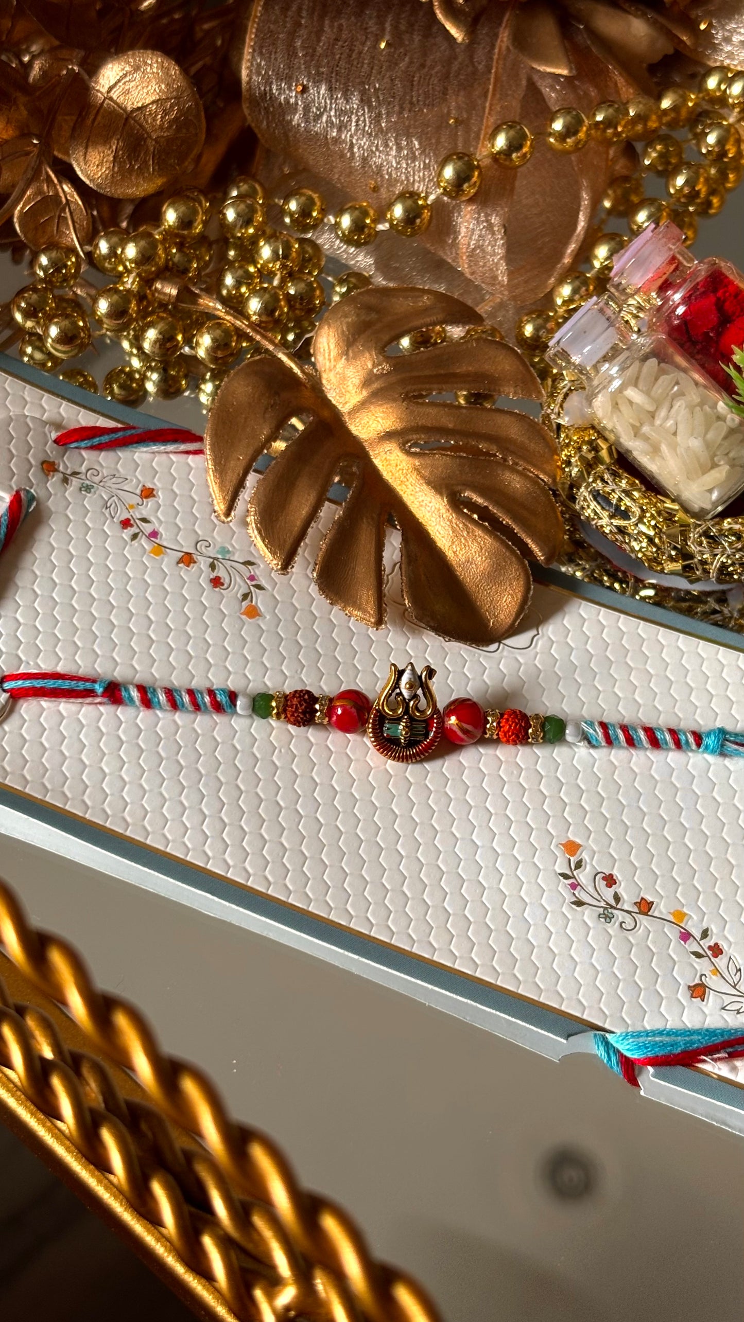 Lord shiva inspired rudraksh rakhi (red&blue) (shipping will be extra)