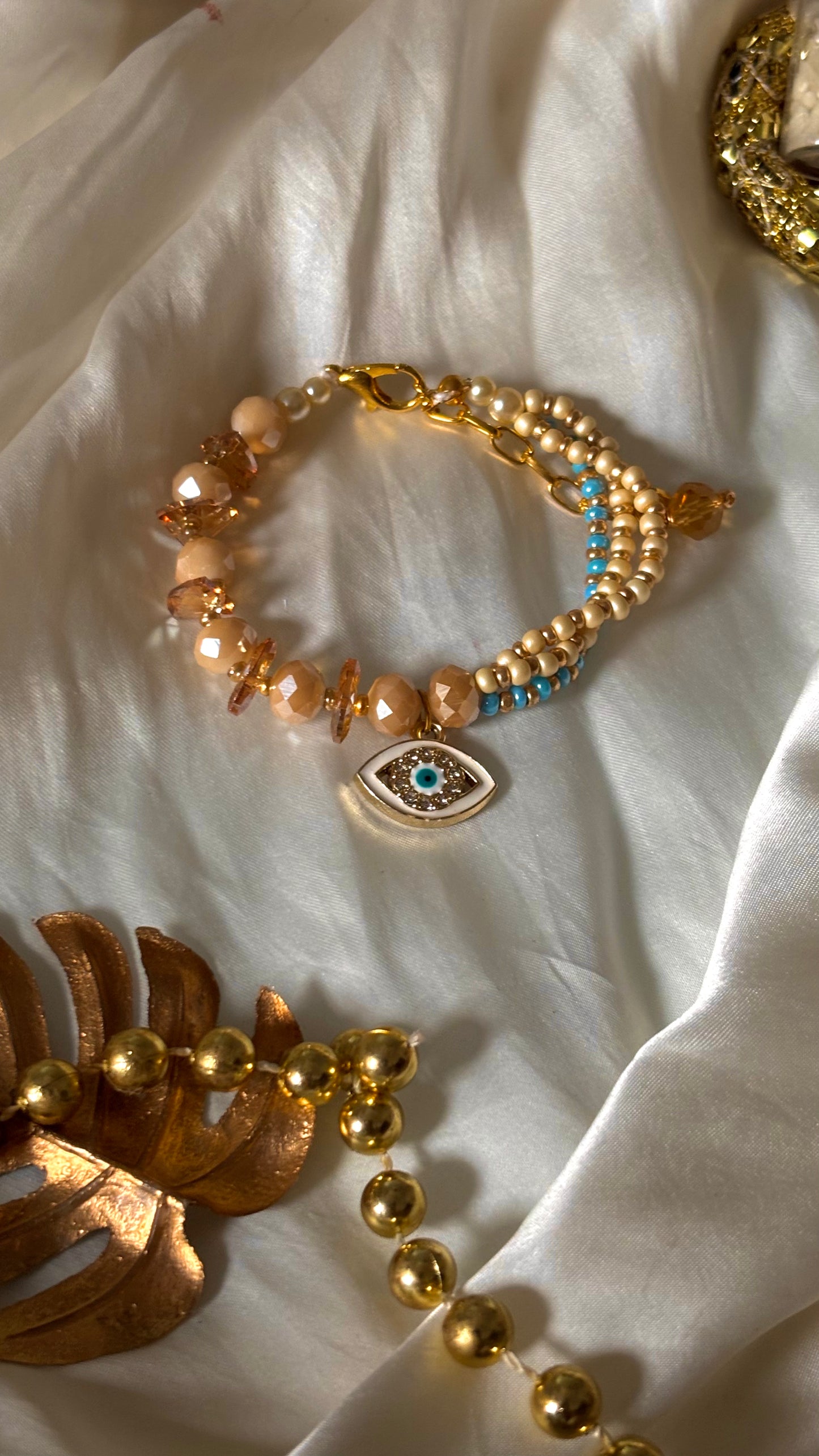 Evil eye peach & firoza designer Rakhi bracelet ( shipping will be extra )