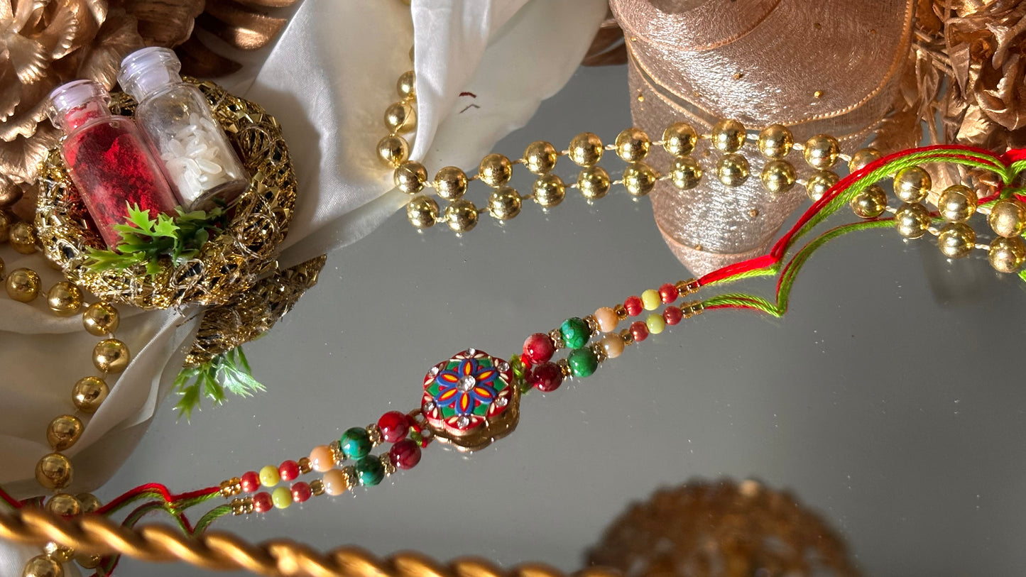 Floral meenkari nakashi minimalist rakhi ( shipping will be extra )