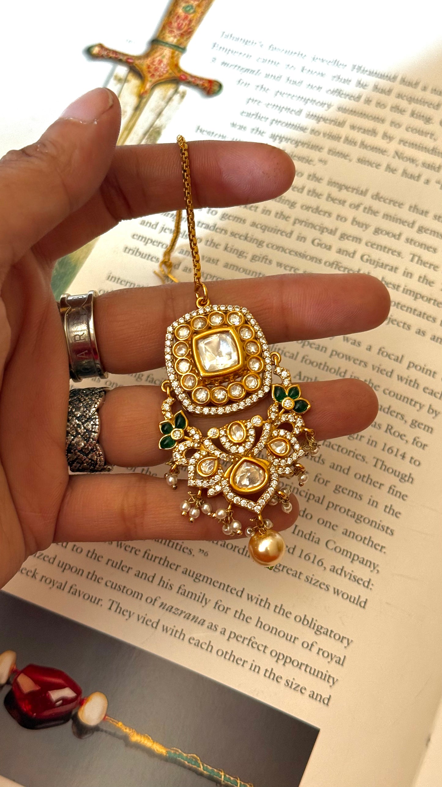 Uncut polki emerald floral mangtika with pearl detailing