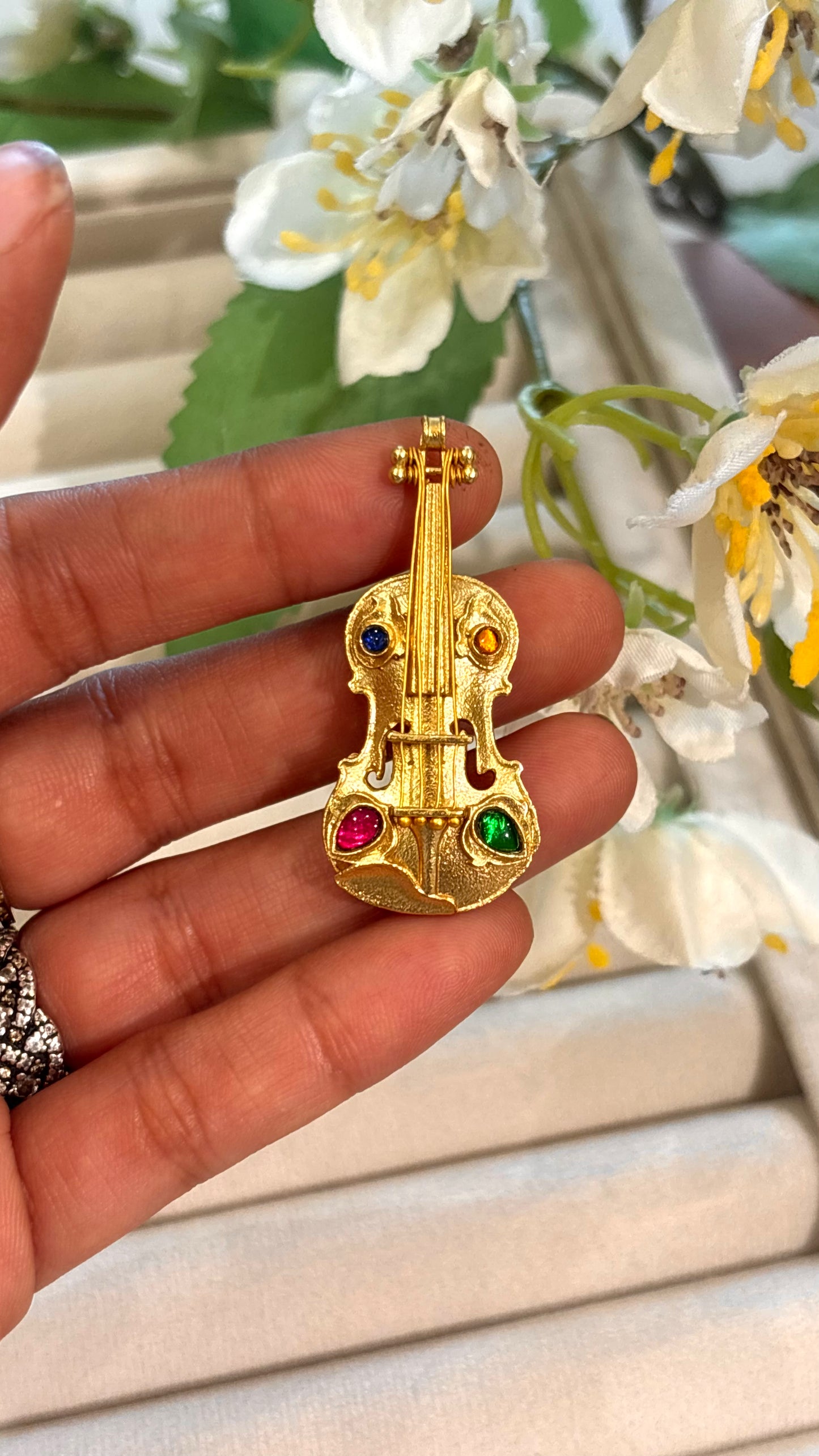 Guitar designer brooch