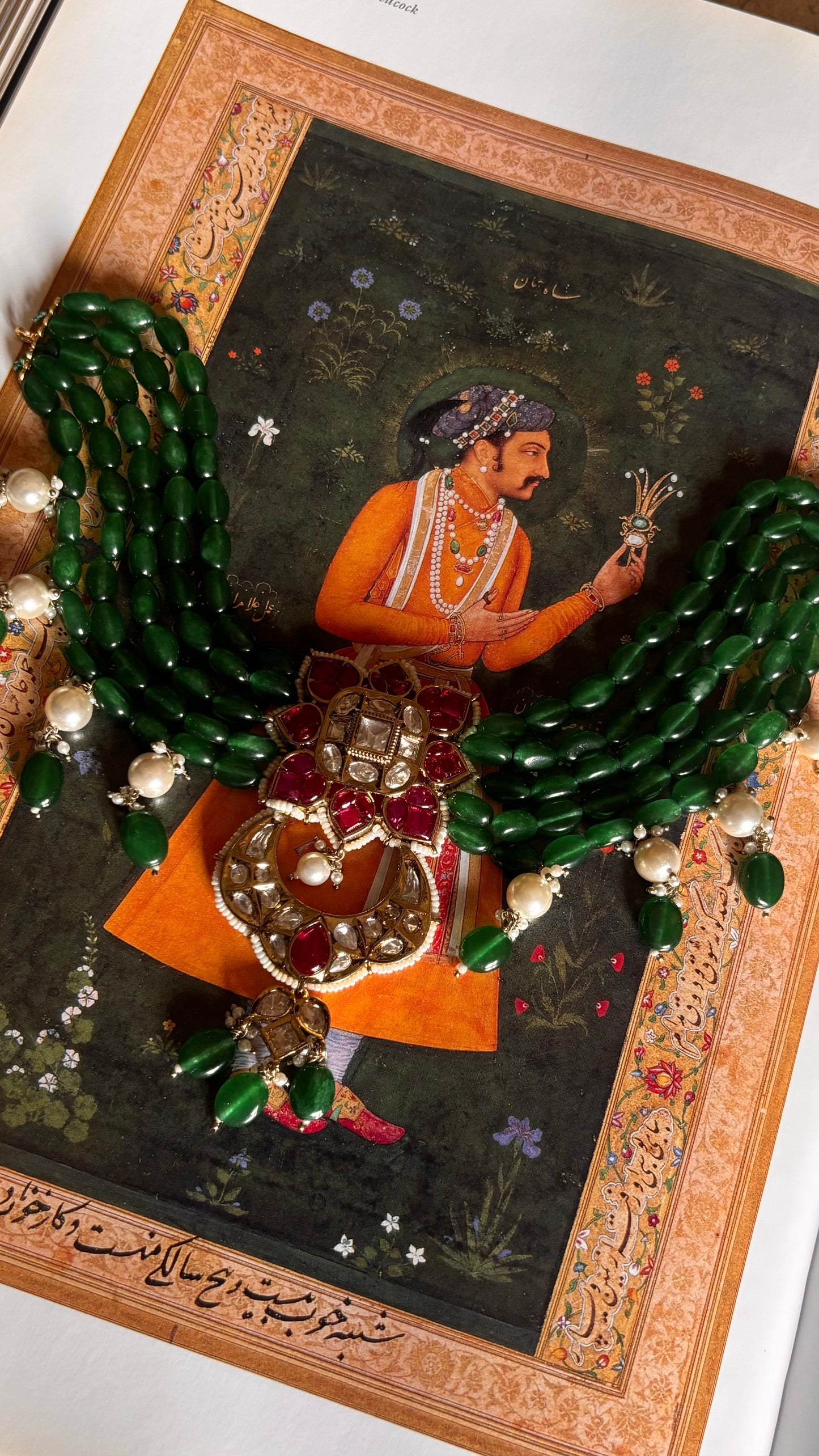 Svara Ruby kat dana with emerald white string choker with earrings