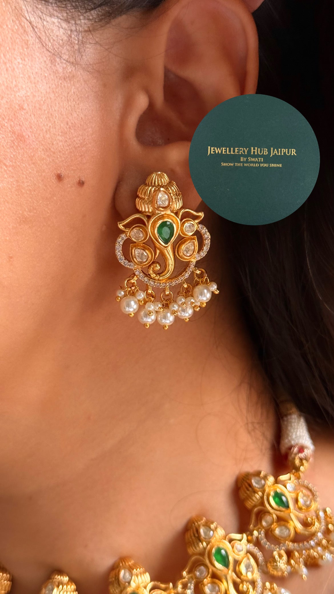 Lord ganesh with emerald & pearl drop temple set