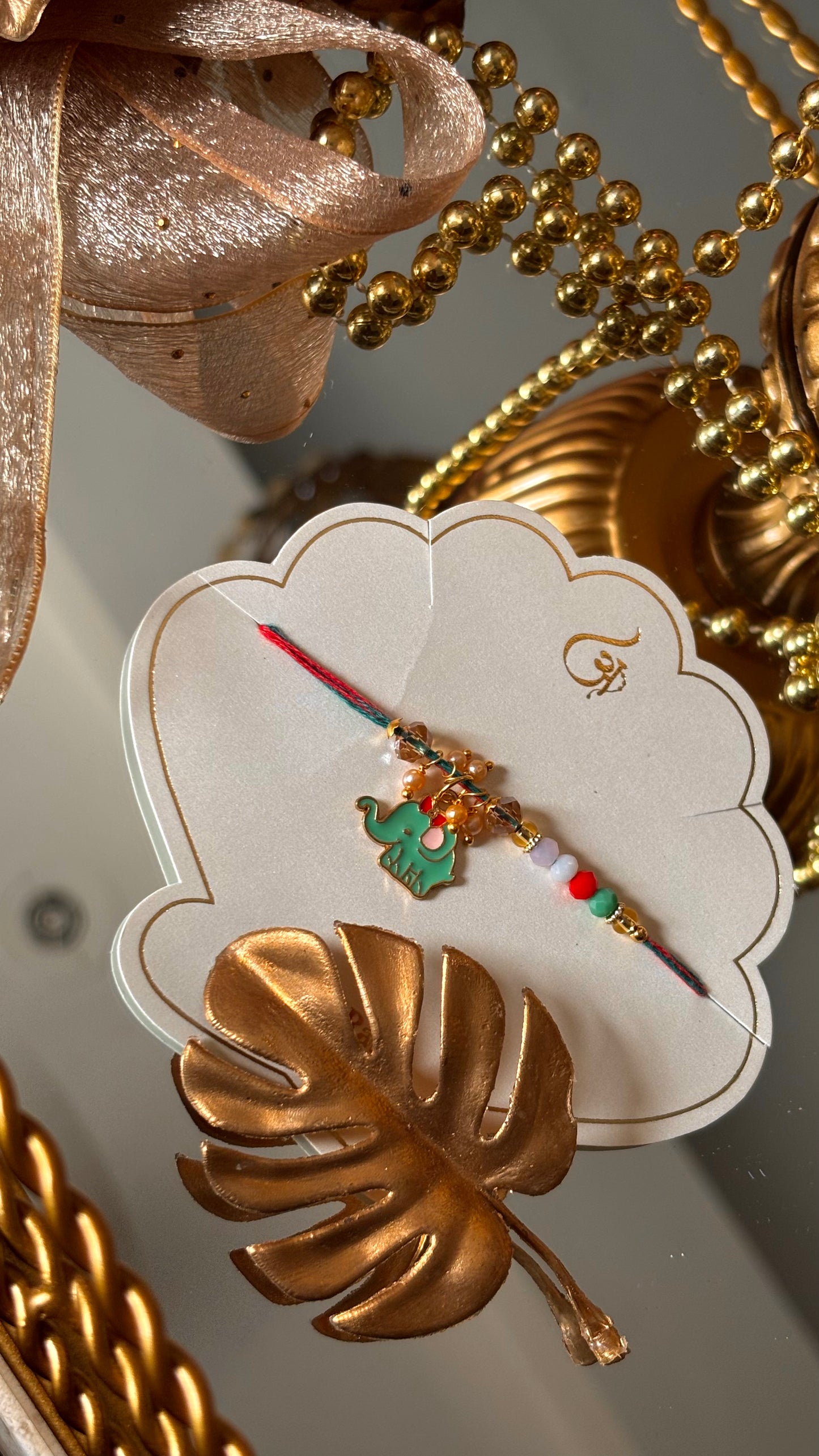 Mint gajanand rakhi ( shipping will be extra )