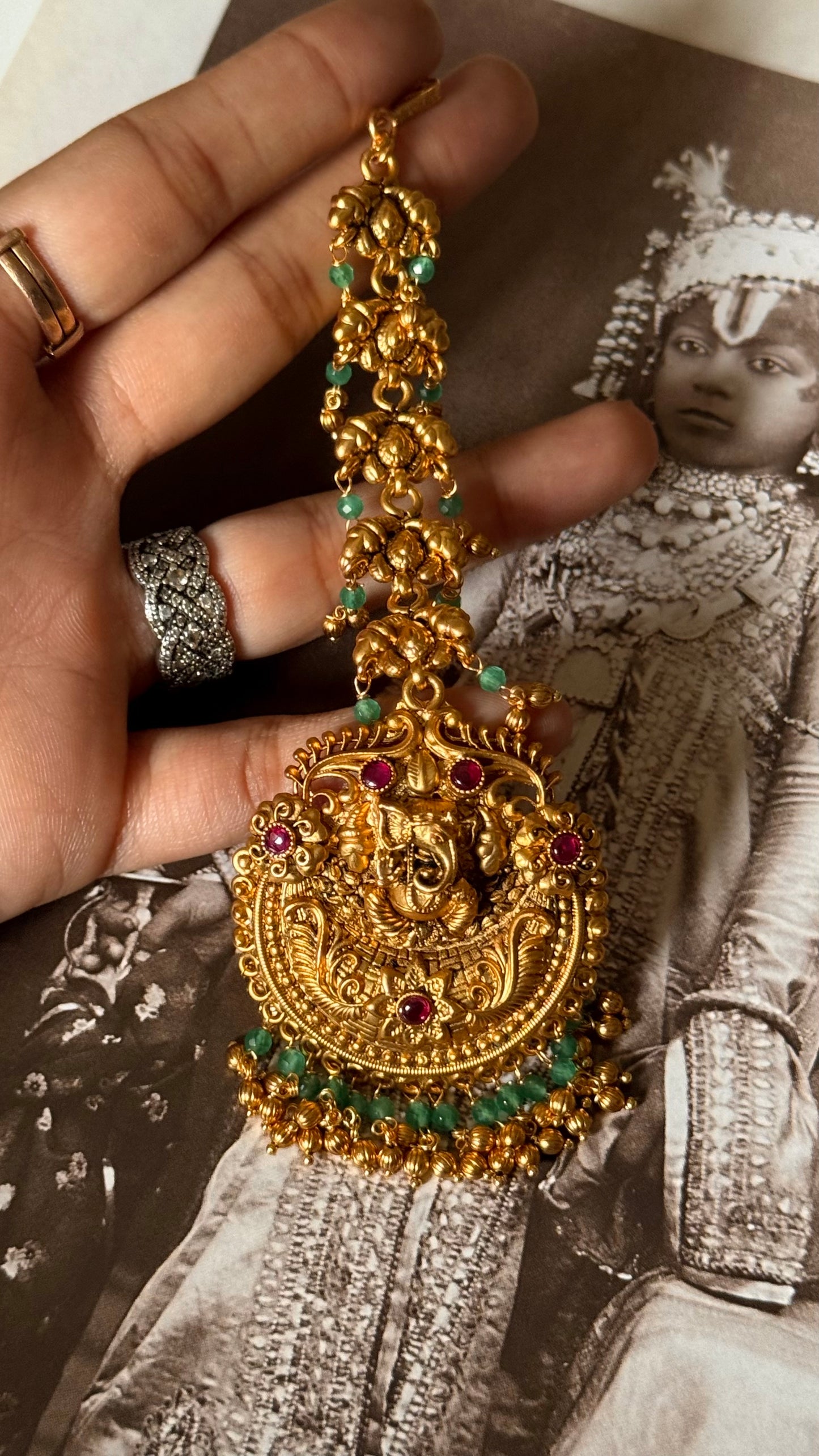 Lord ganesh rani pink & emerald maangtika