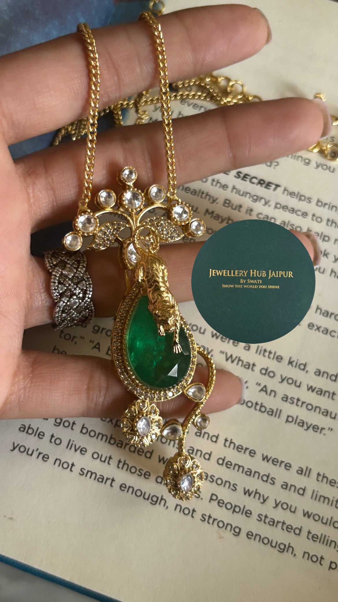 Emerald Sabyasachi tiger down pendant set