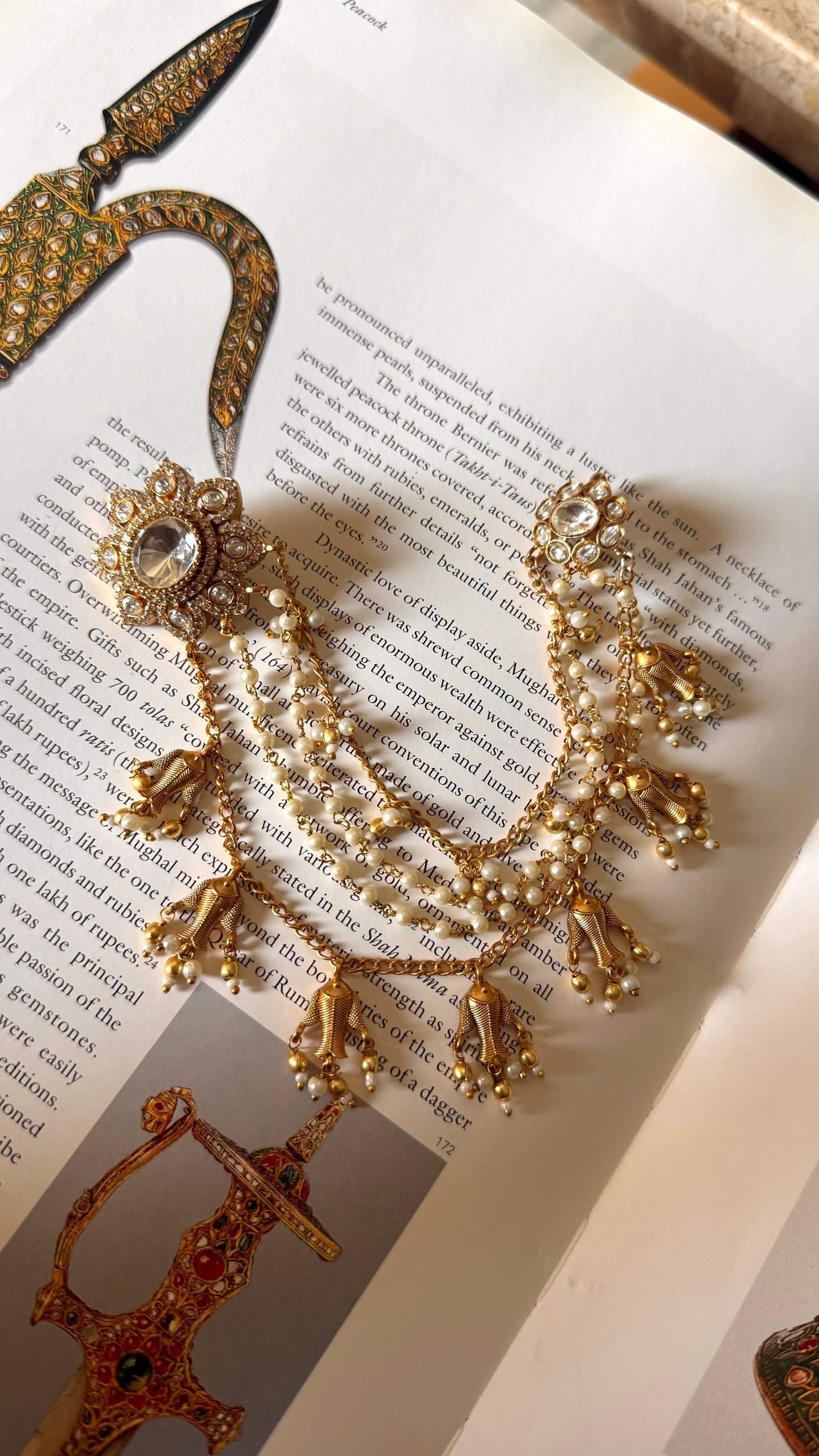 Floral studs attached with fish drops Kaanchain