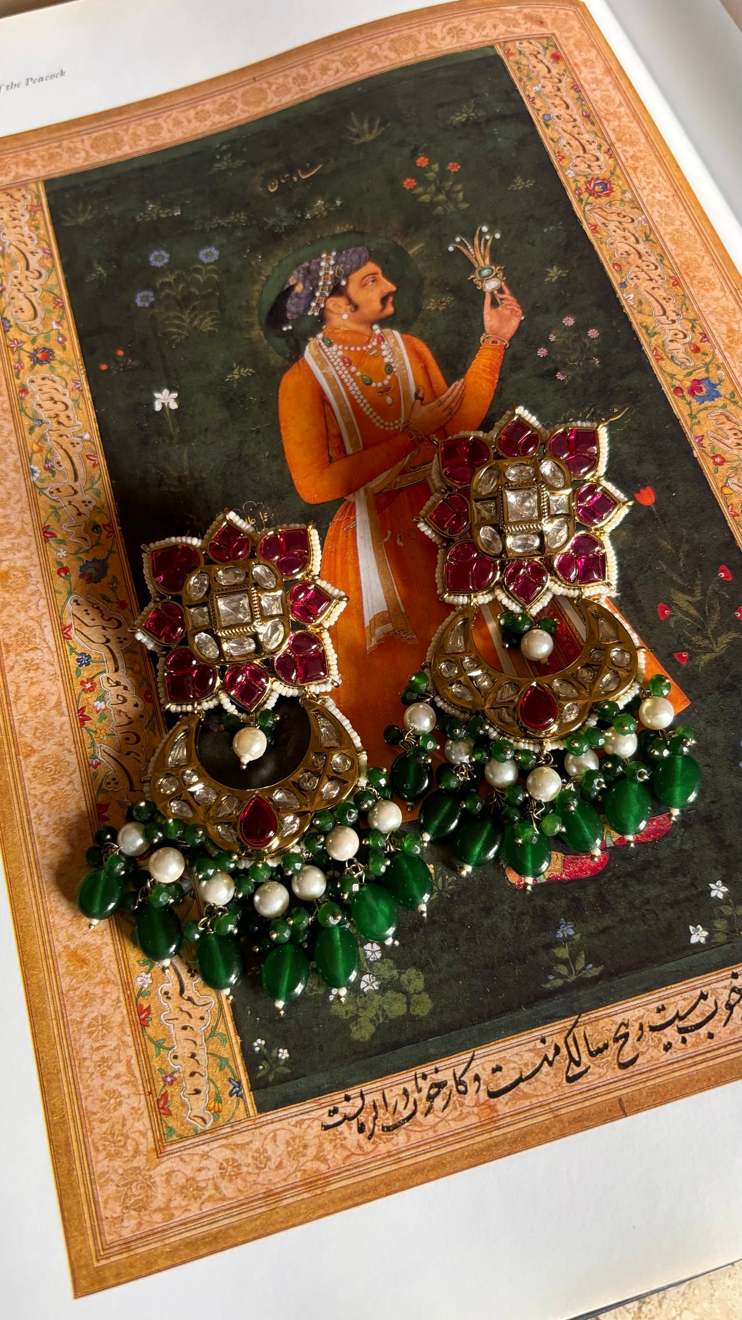Svara Ruby kat dana with emerald white string choker with earrings