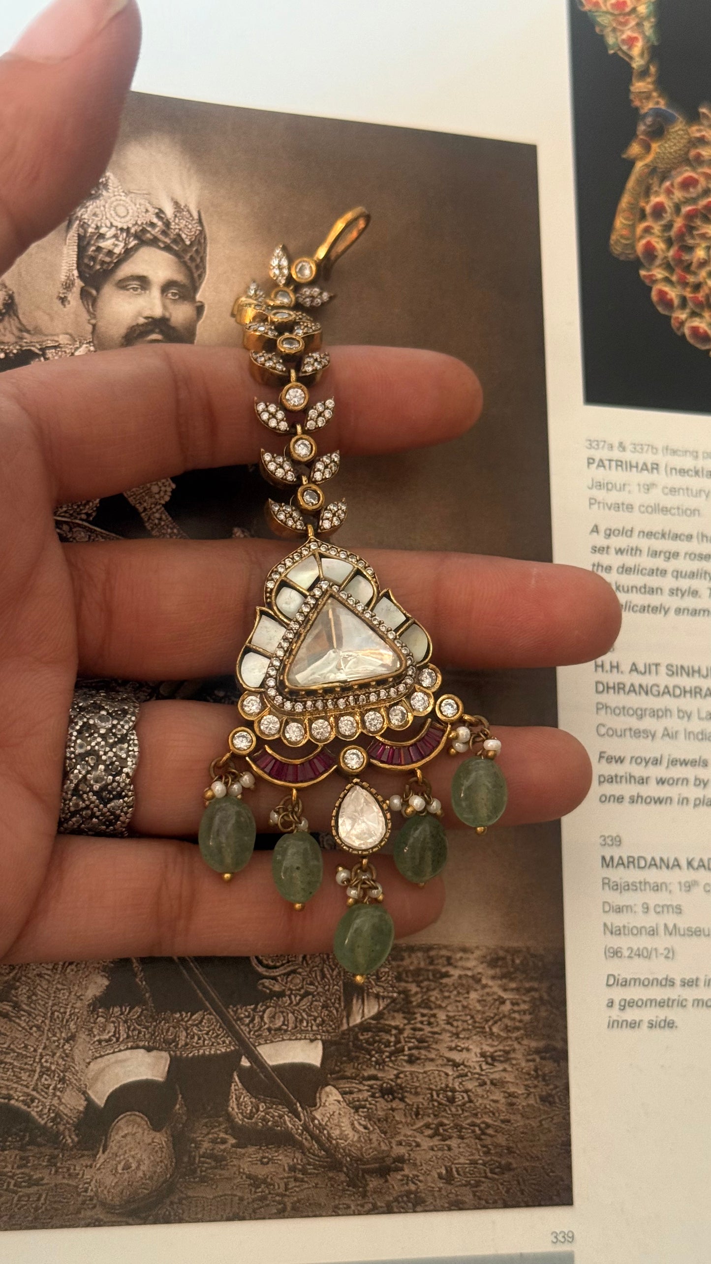 Mother of pearl maangtika with ruby detailing