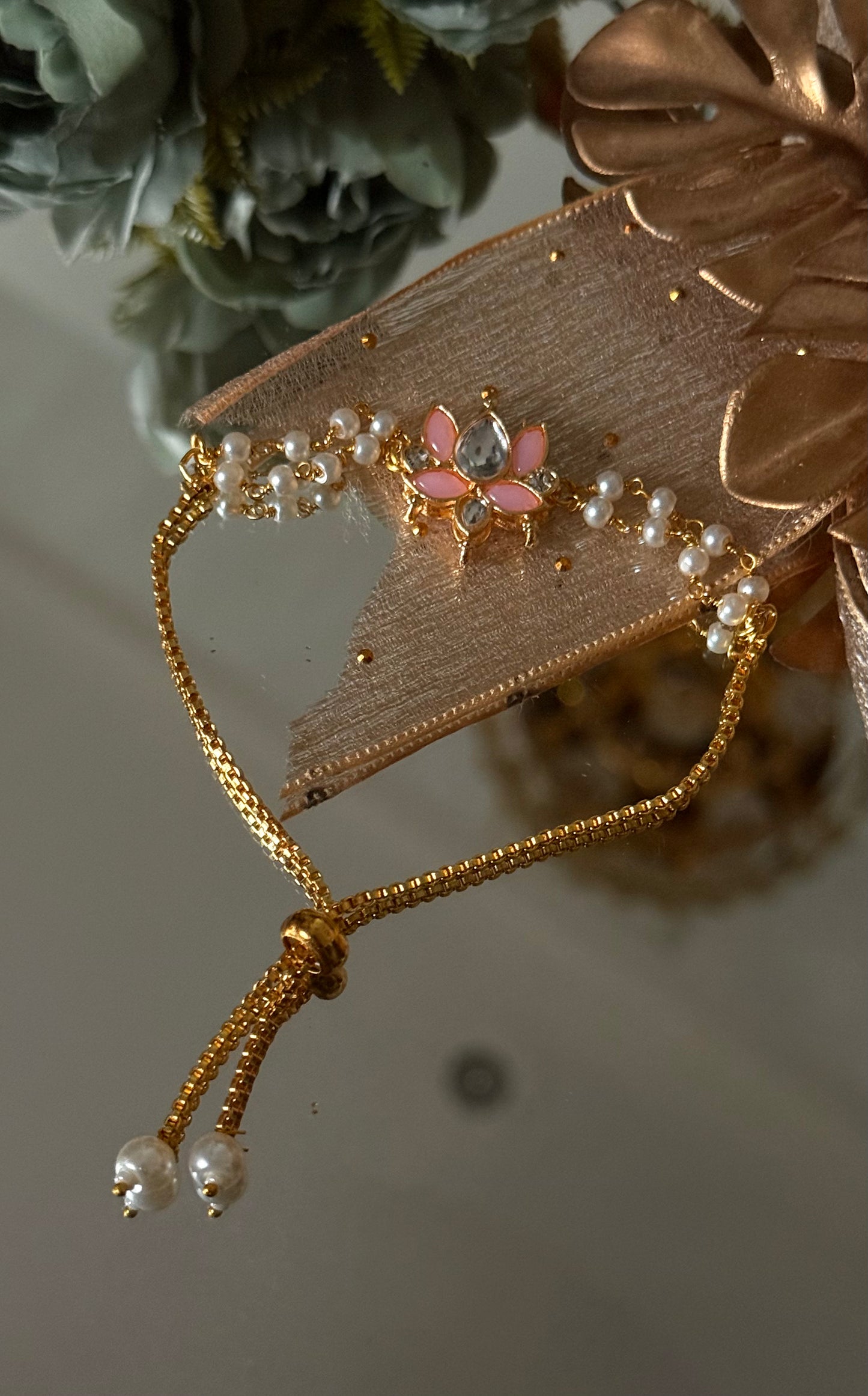 Rose quartz lotus inspired rakhi