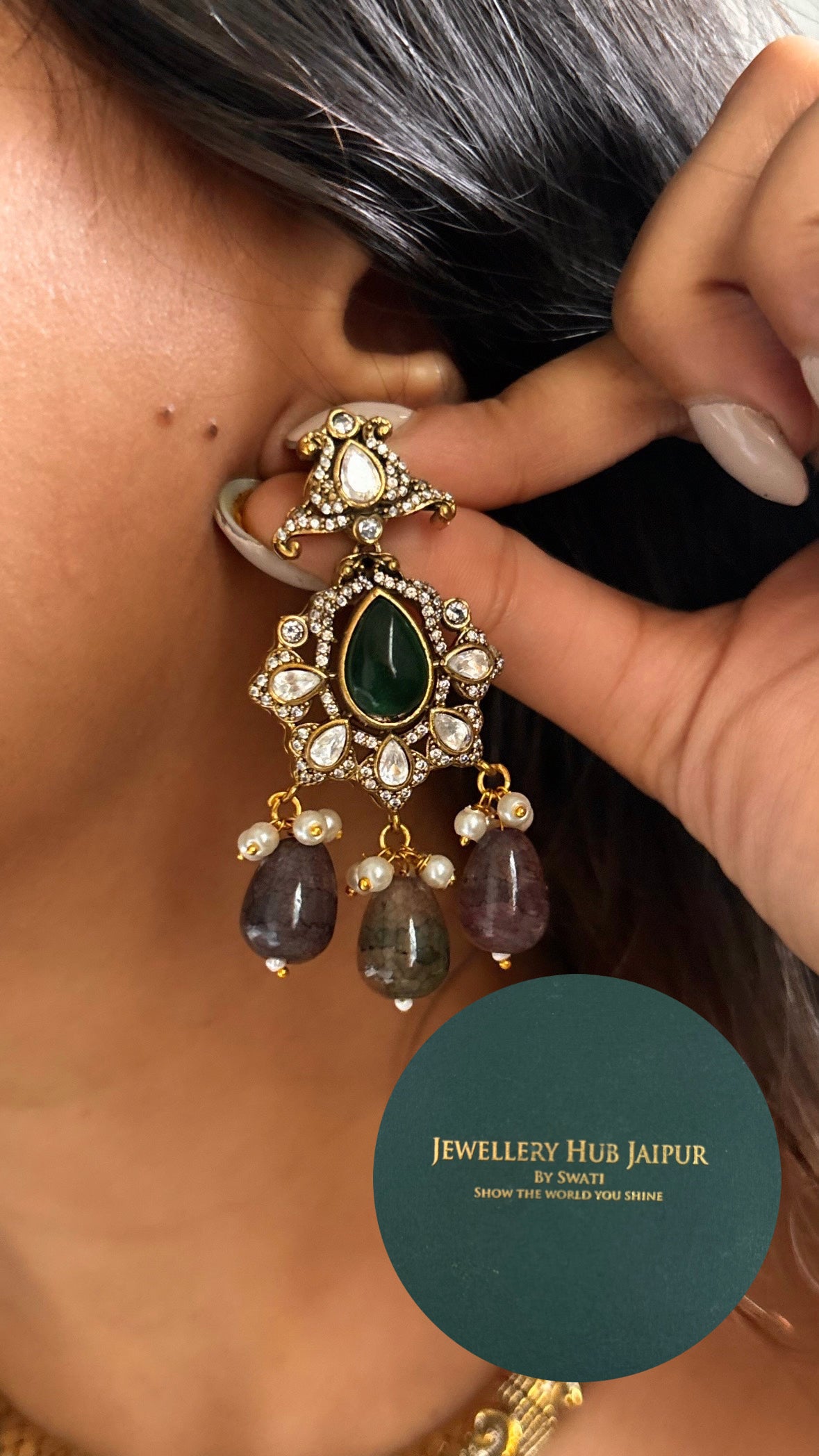 Designer emerald hasli