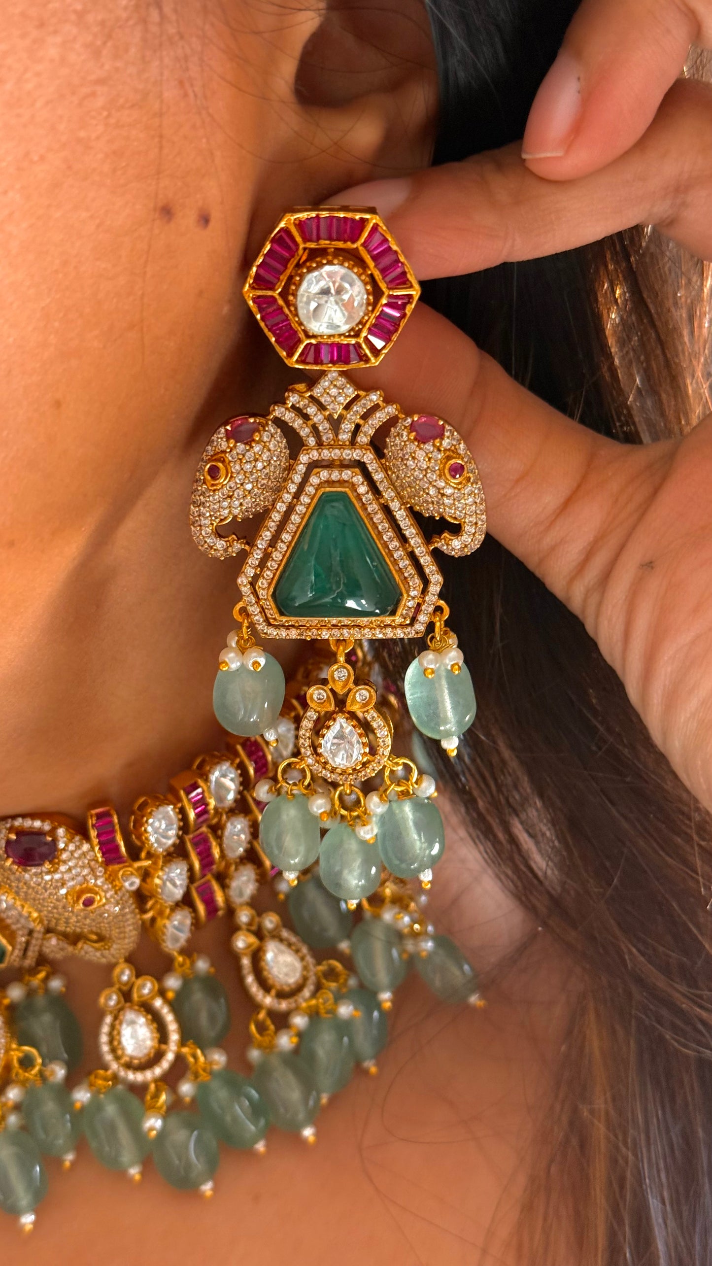 Gajanand emerald doublet and rani pink choker