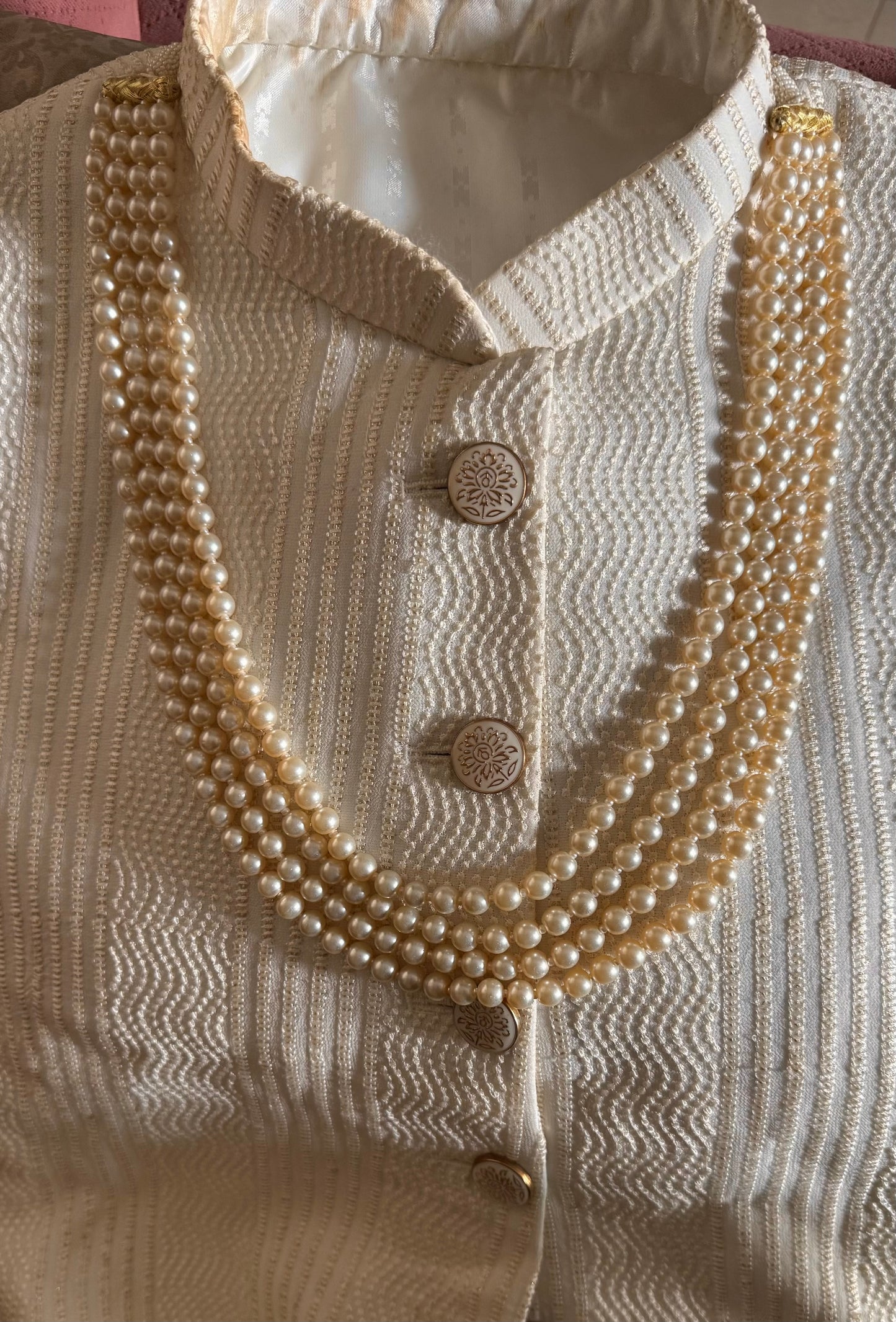 Four line off white Pearl string