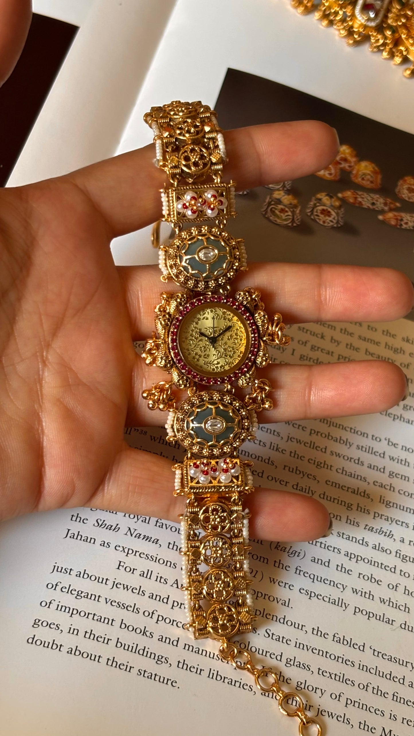 Rajwada emerald gold dial dark gold watch