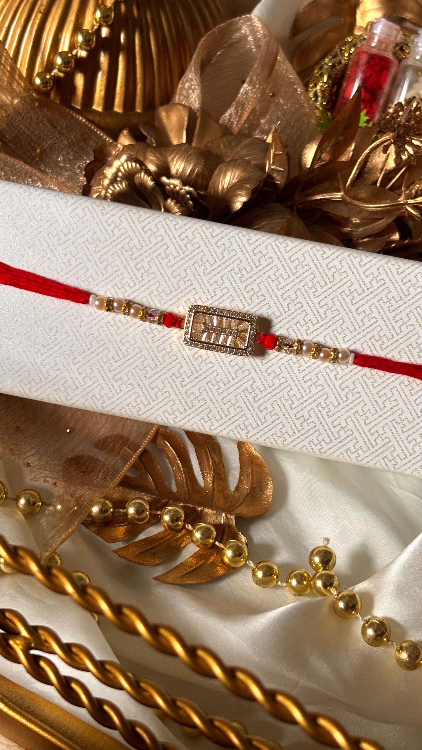 Cz Diamond red thread rakhi ( shipping will be extra )