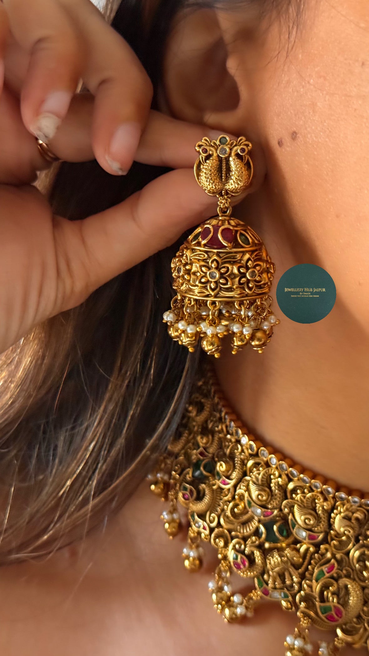 Goddess laxmi with emerald & rani pink choker set