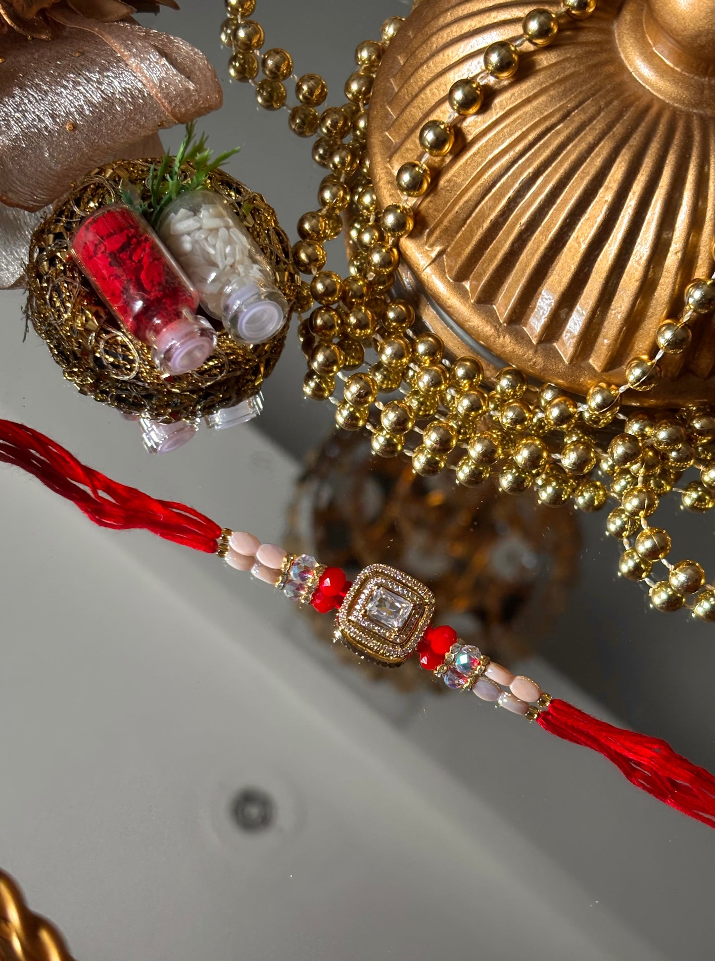 Diamond polki red rakhi ( shipping will be extra )