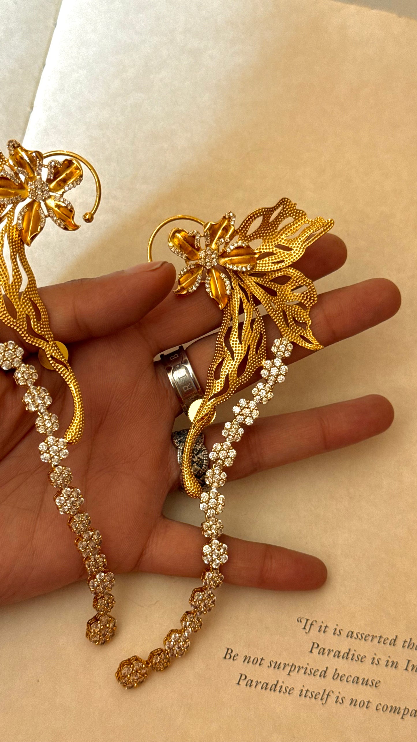 Designer Carnival ear cuff with floral diamond earrings
