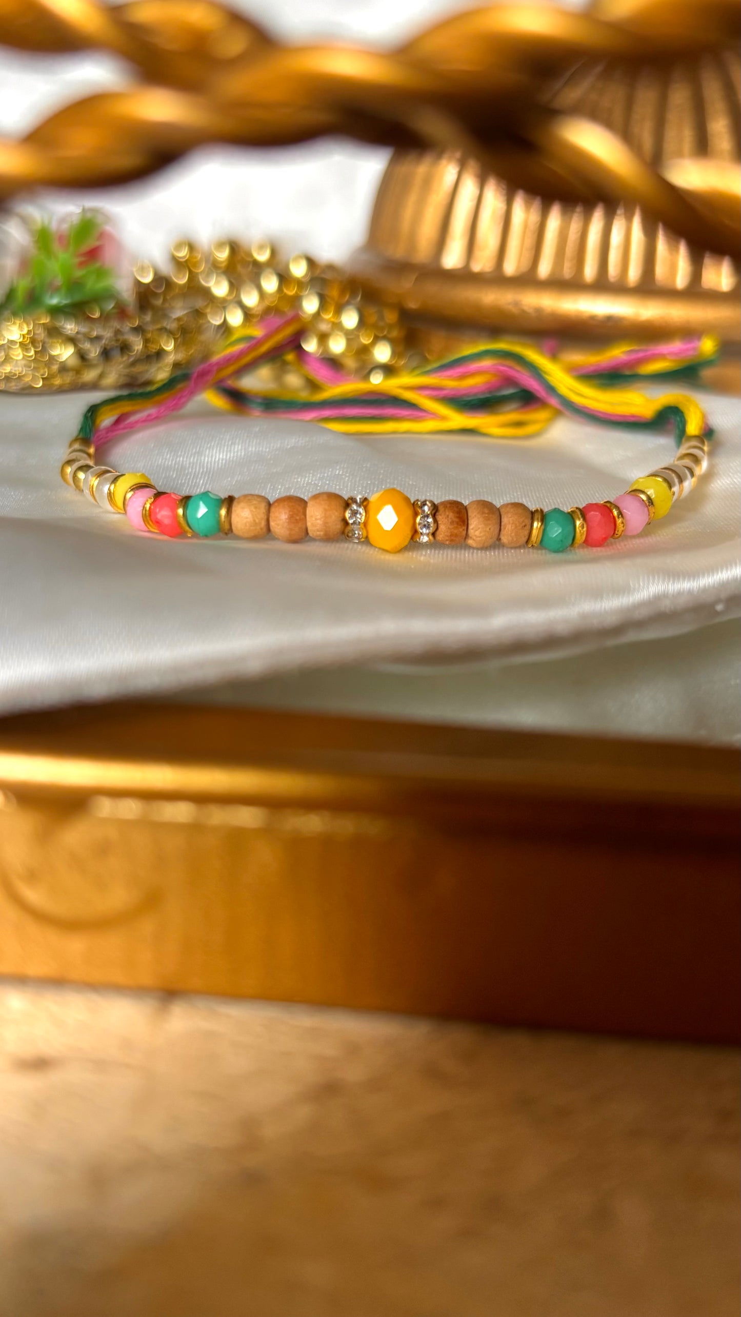 Multicoloured thread Rakhi ( shipping will be extra )