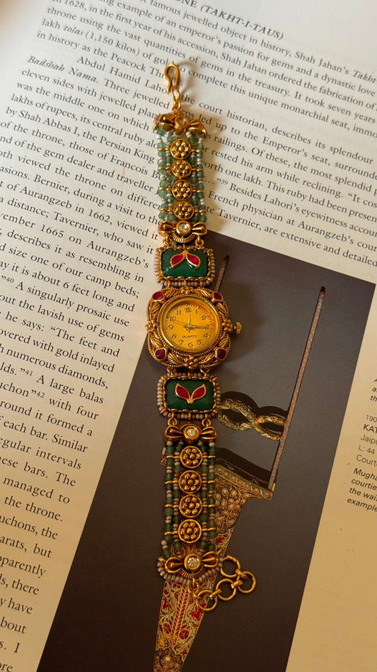 Emerald inlay golden dial rajwada watch
