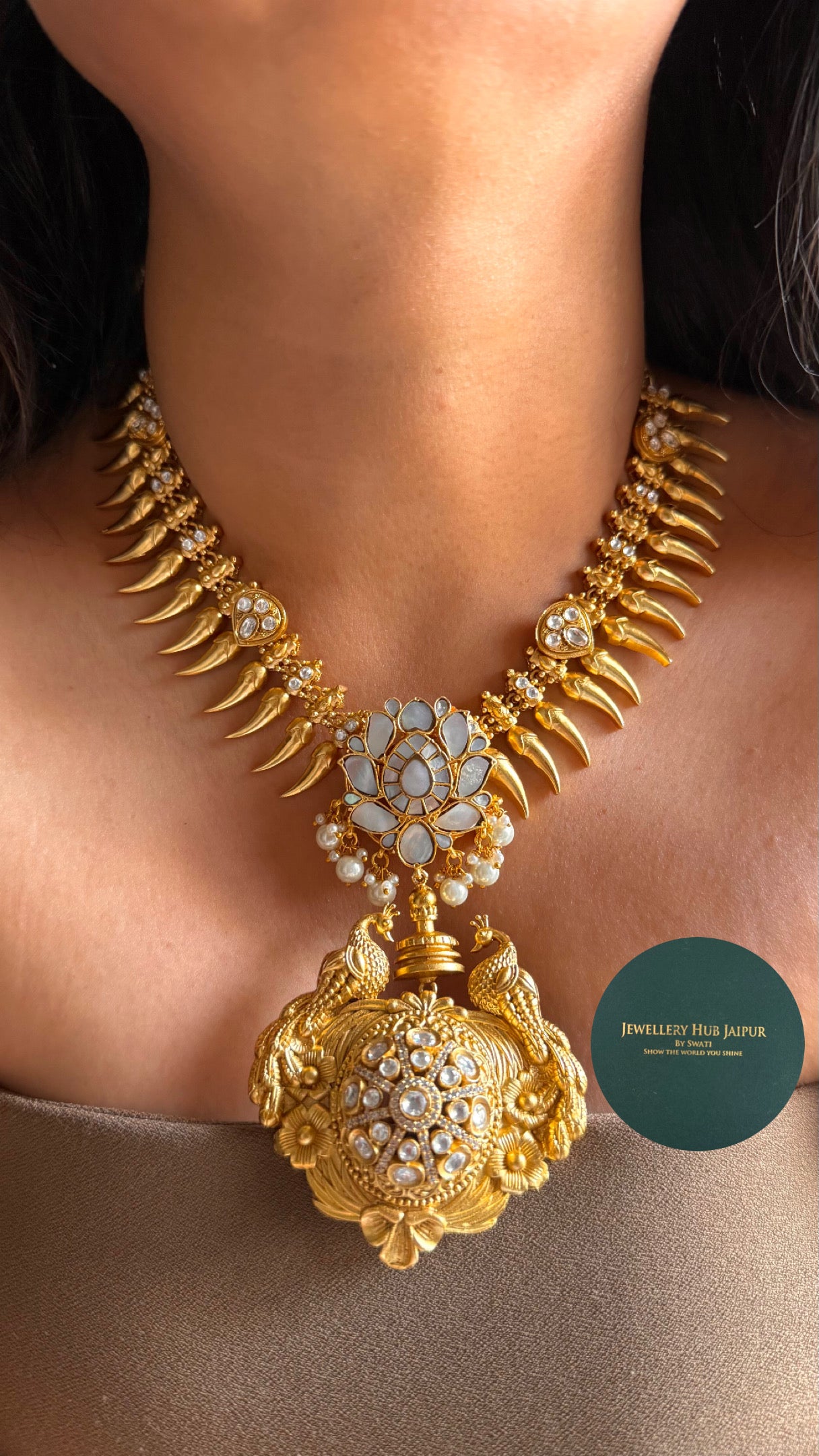 Peacock inspired designer gold polish contemporary necklace
