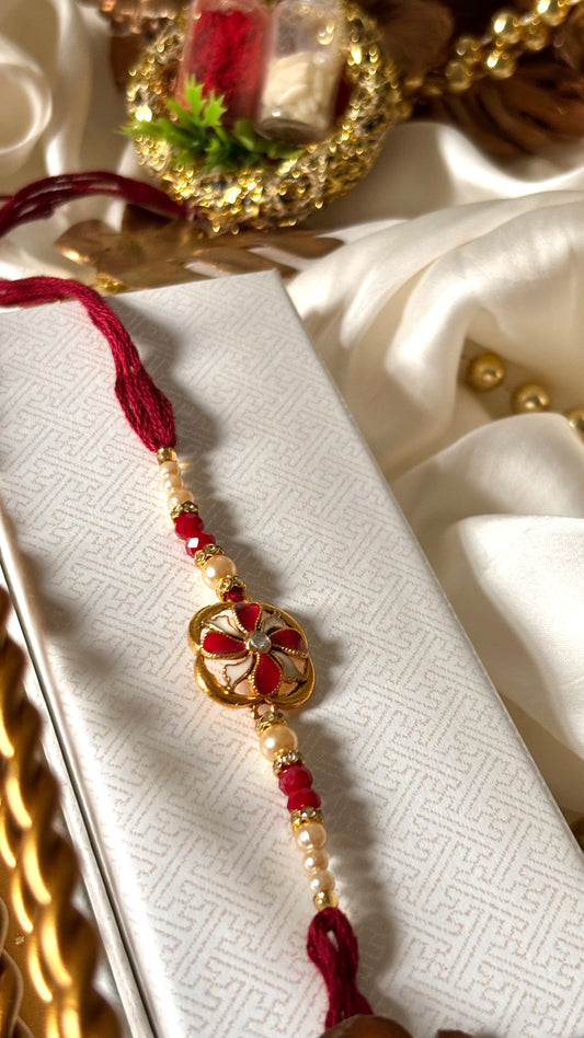 Ruby meenkaari pearl floral rakhi ( shipping will be extra )