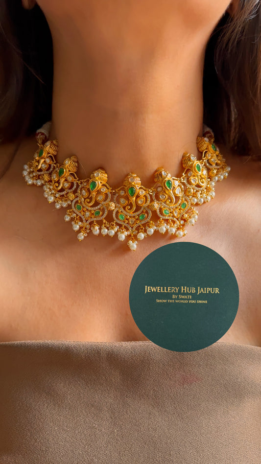 Lord ganesh with emerald & pearl drop temple set