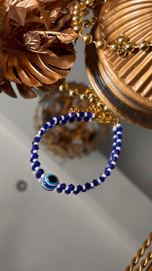 Evil eye sapphire rakhi ( shipping will be extra )