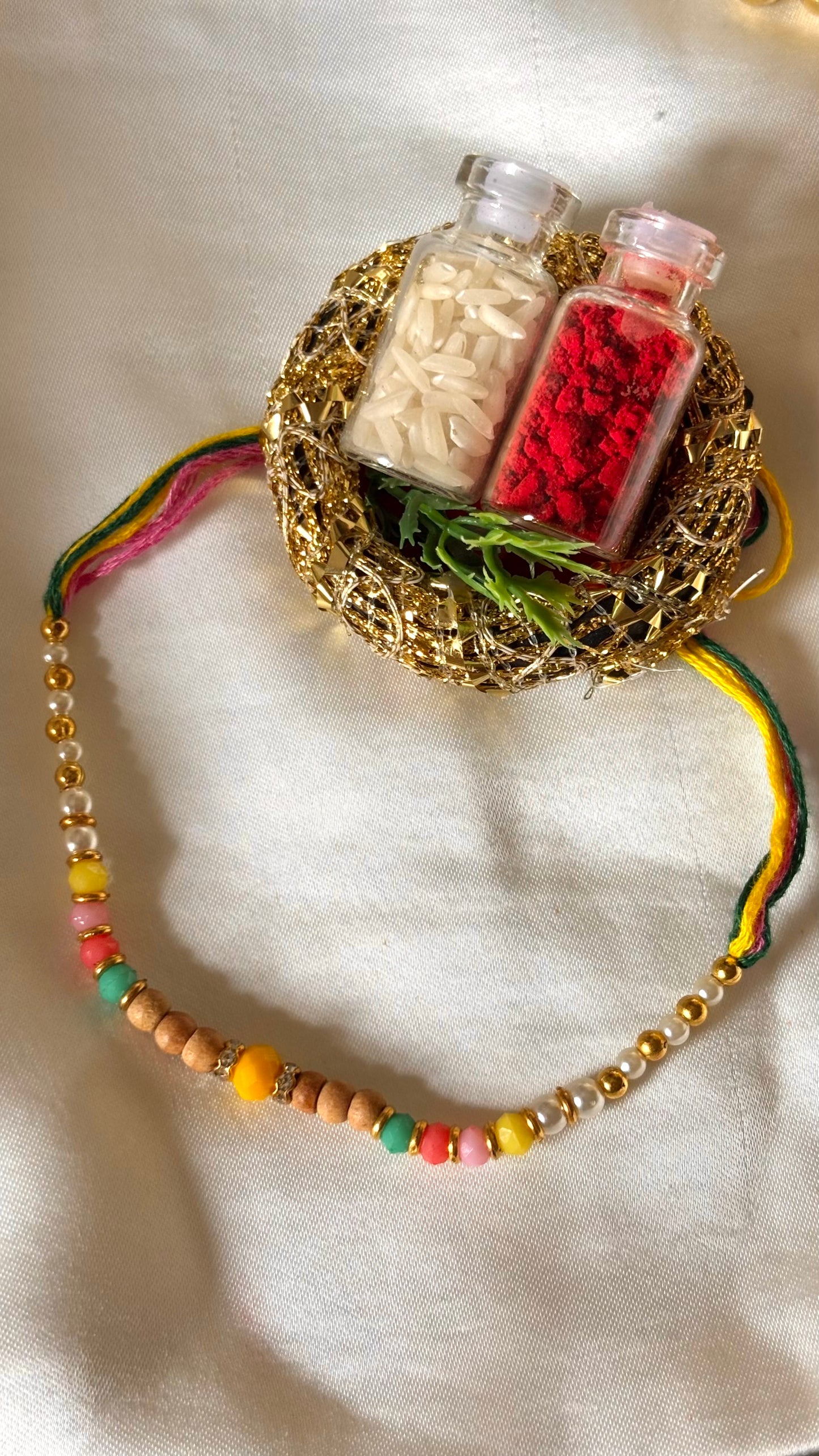 Multicoloured thread Rakhi ( shipping will be extra )