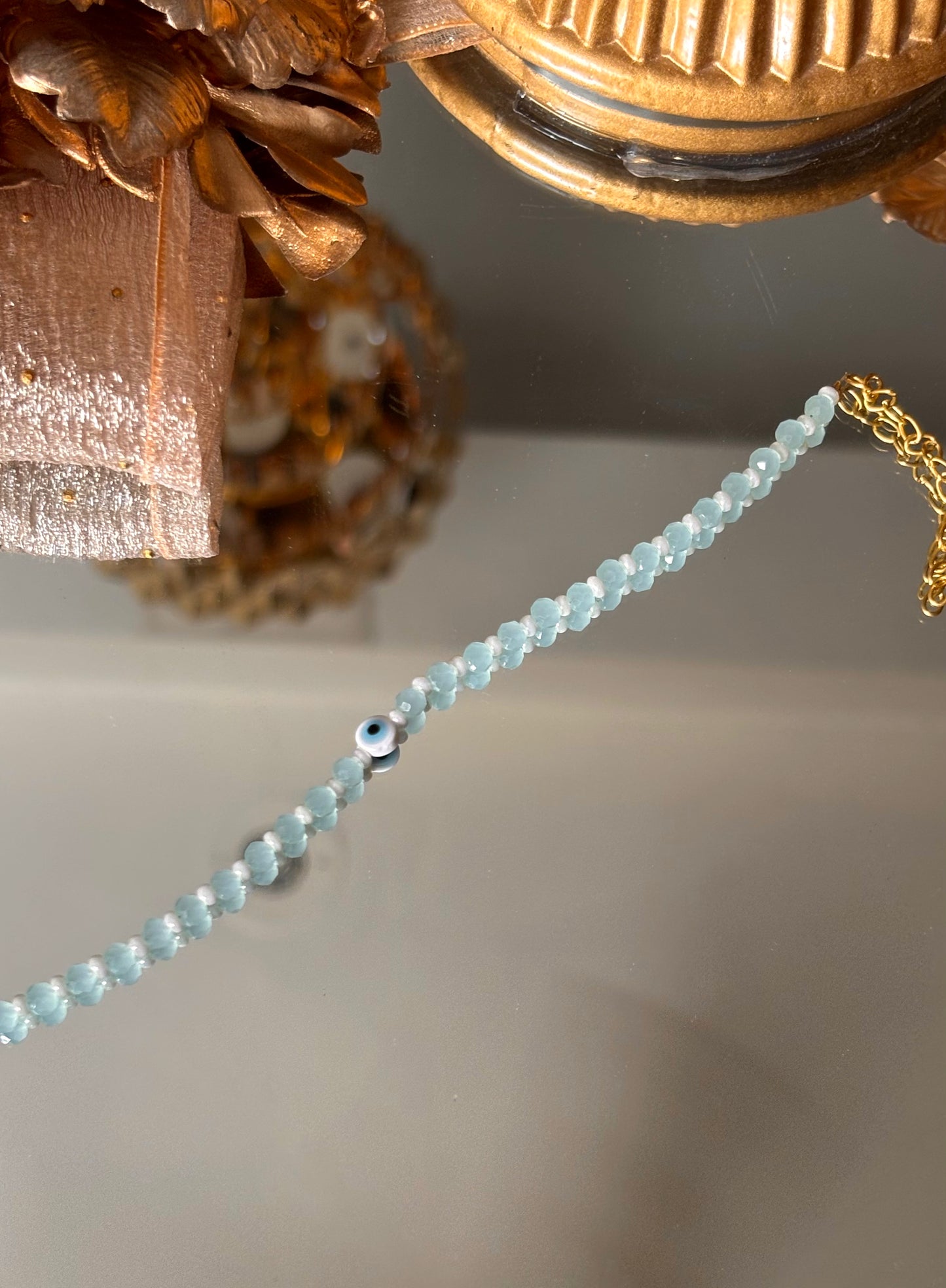 Evil eye rakhi (powder blue) (shipping will be extra )