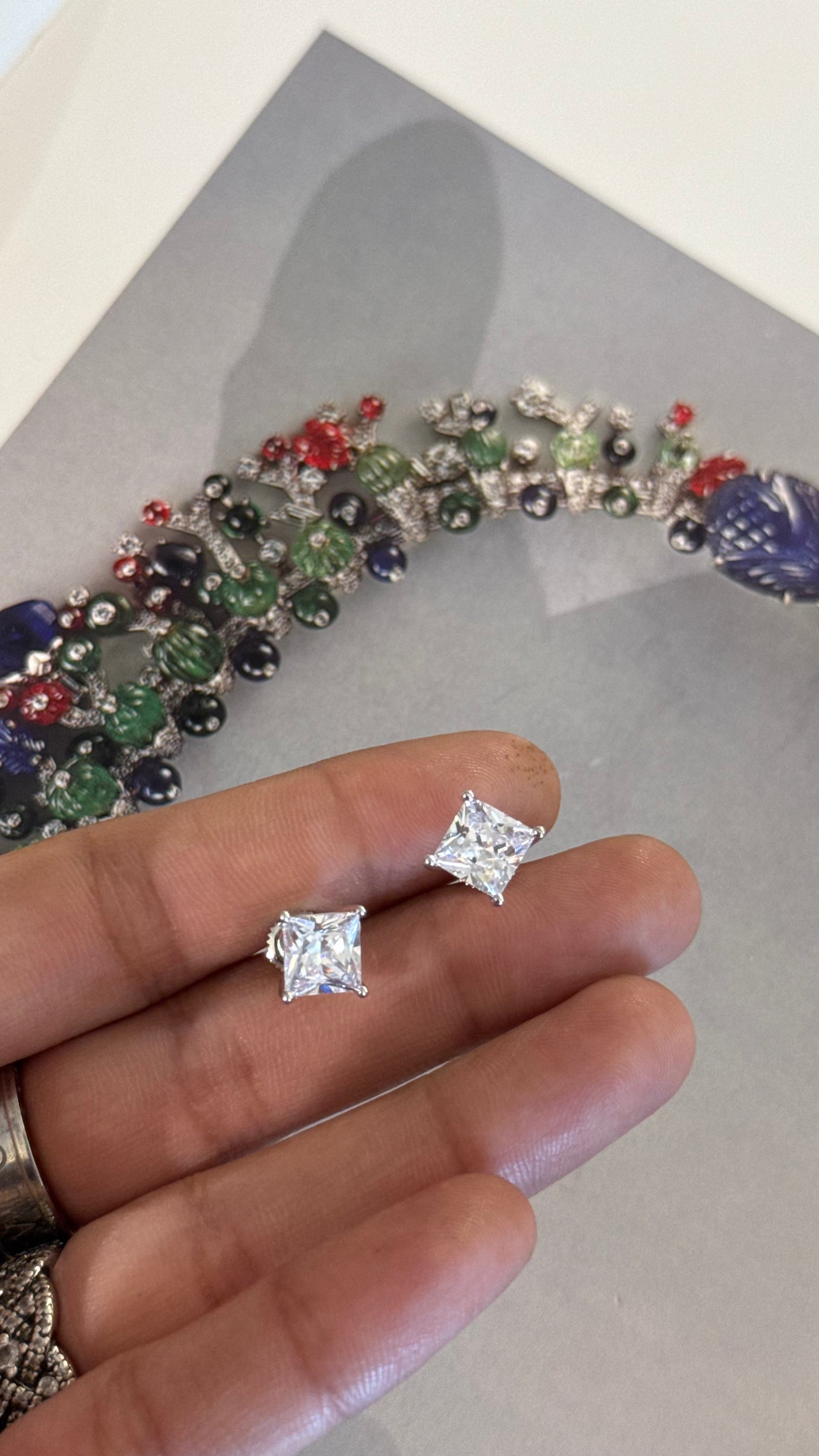 Rhodium Emerald cut diamond studs