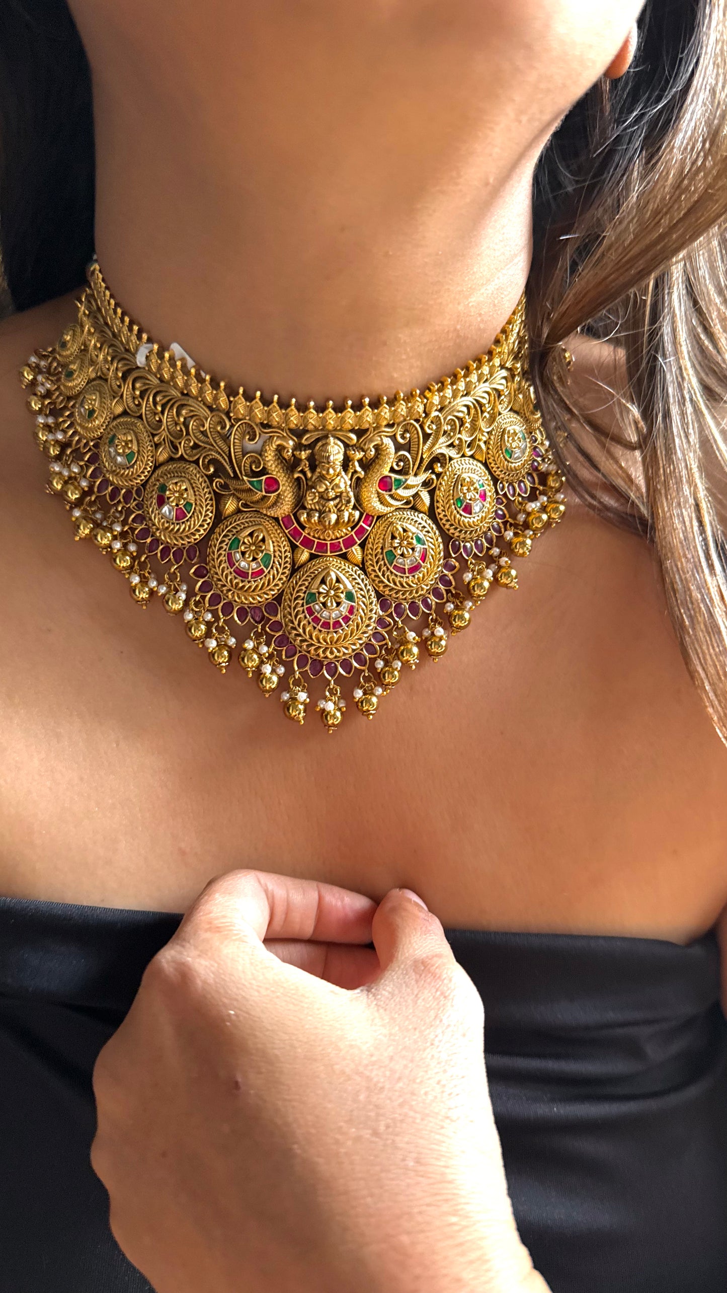 Goddess Laxmi inspired temple jewellery with peacock motif