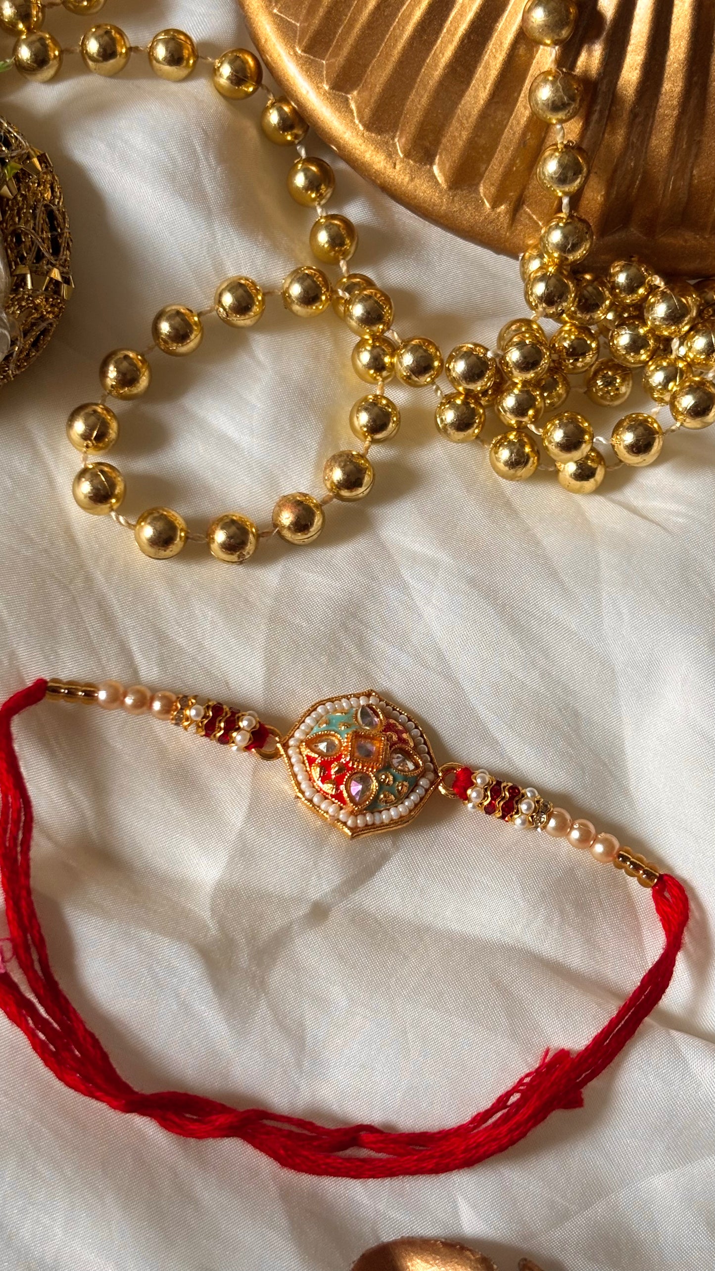 Red & firoza meenakari Kundan designer Rakhi ( shipping will be extra )