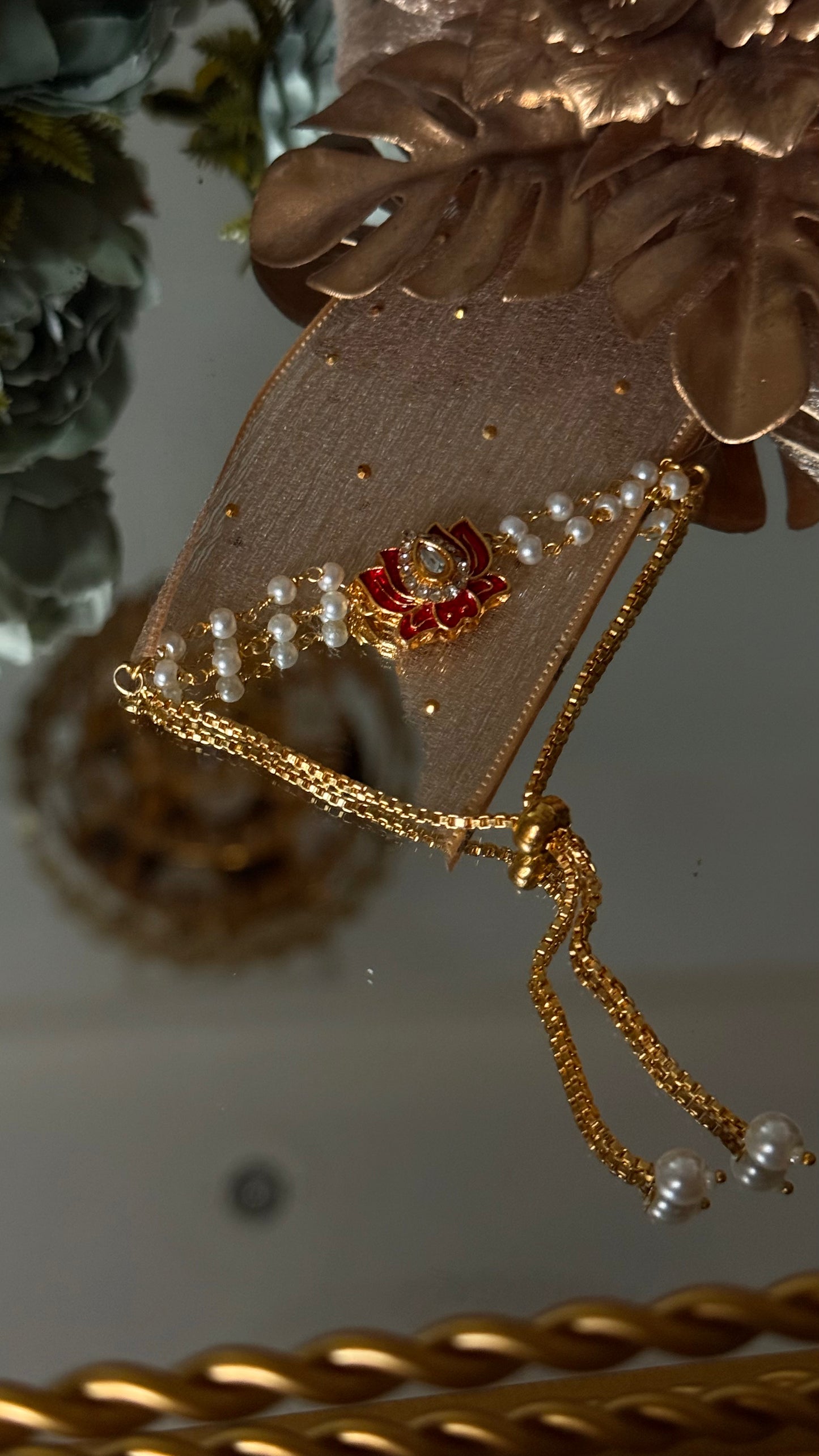 Ruby lotus inspired rakhi