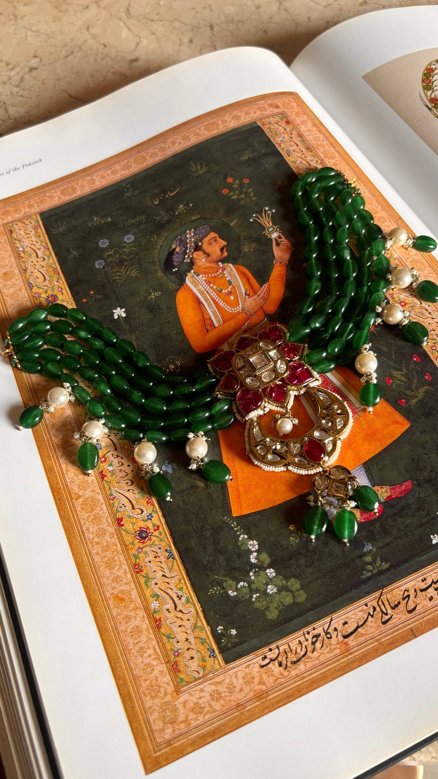 Svara Ruby kat dana with emerald white string choker with earrings