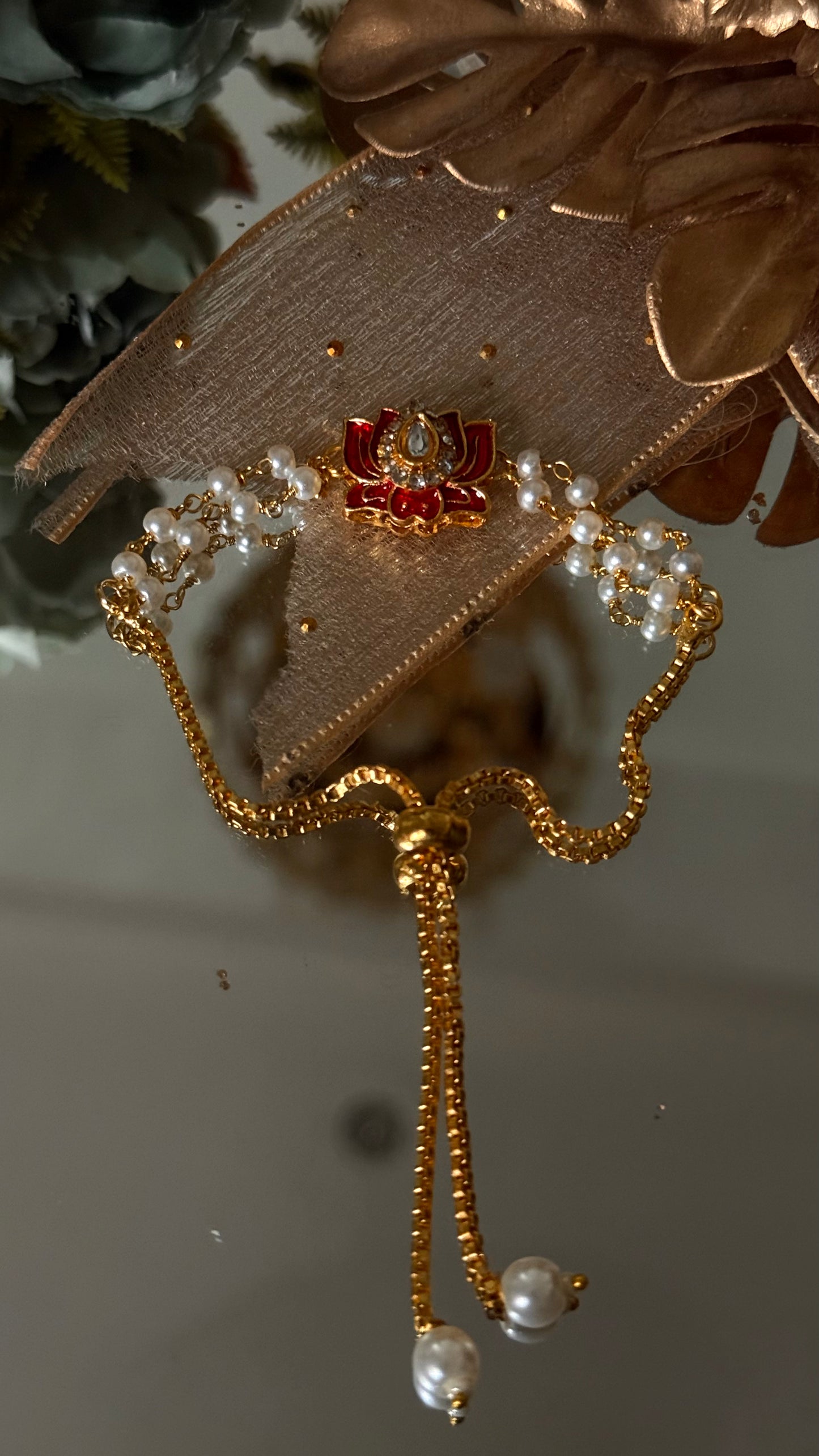 Ruby lotus inspired rakhi