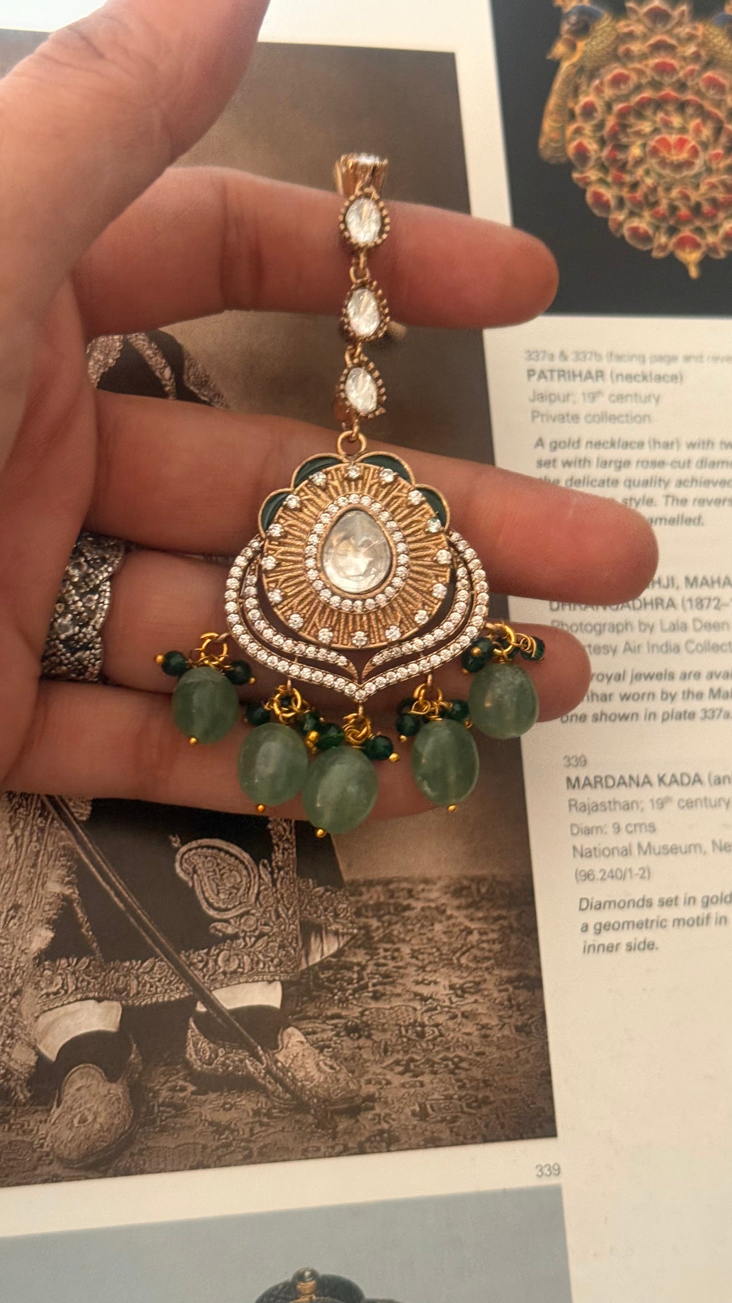 Emerald oxidised gold meena mangtika
