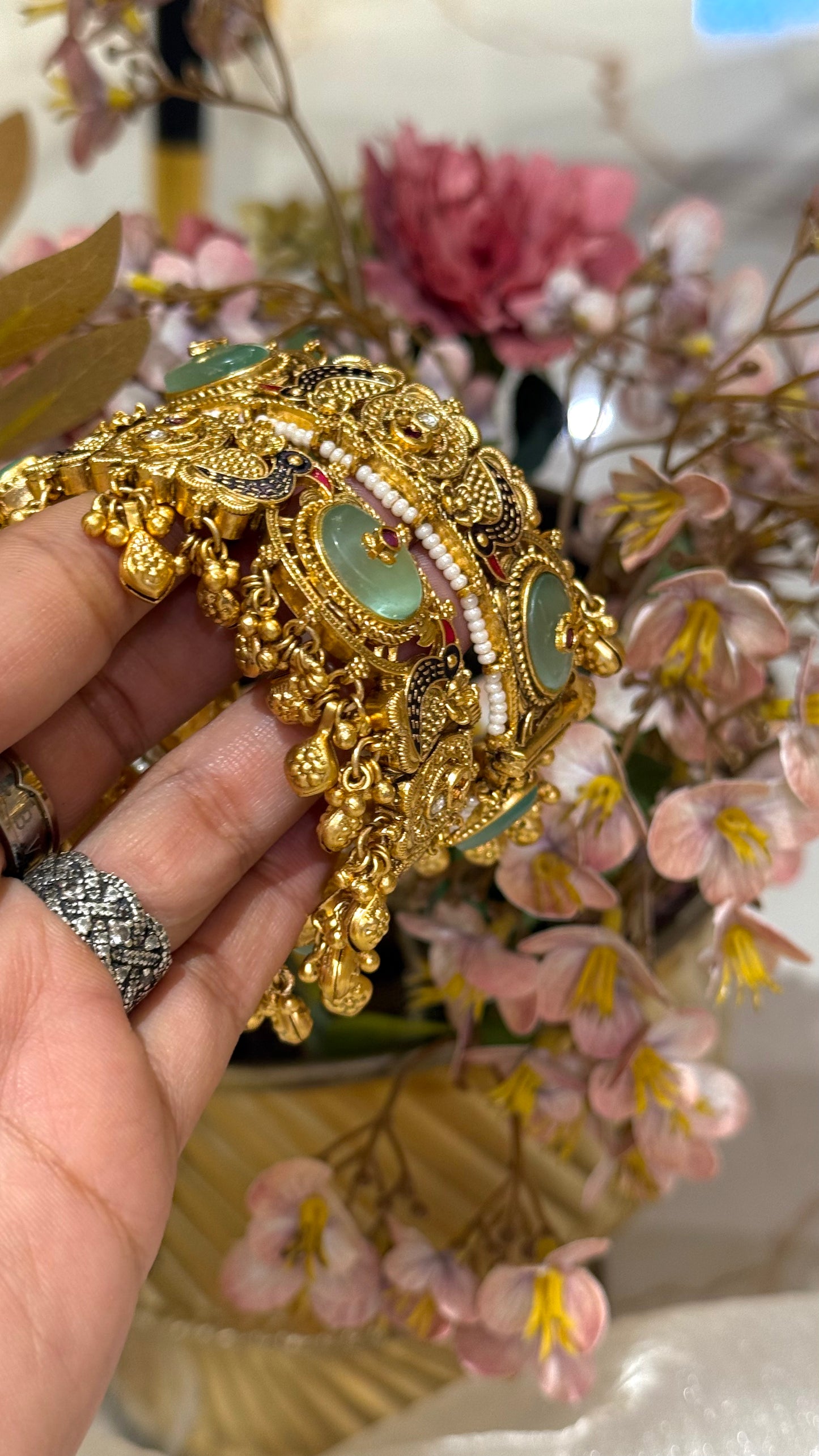 Swarovski  bangles with sapphire Meena Kari and inlay detailing