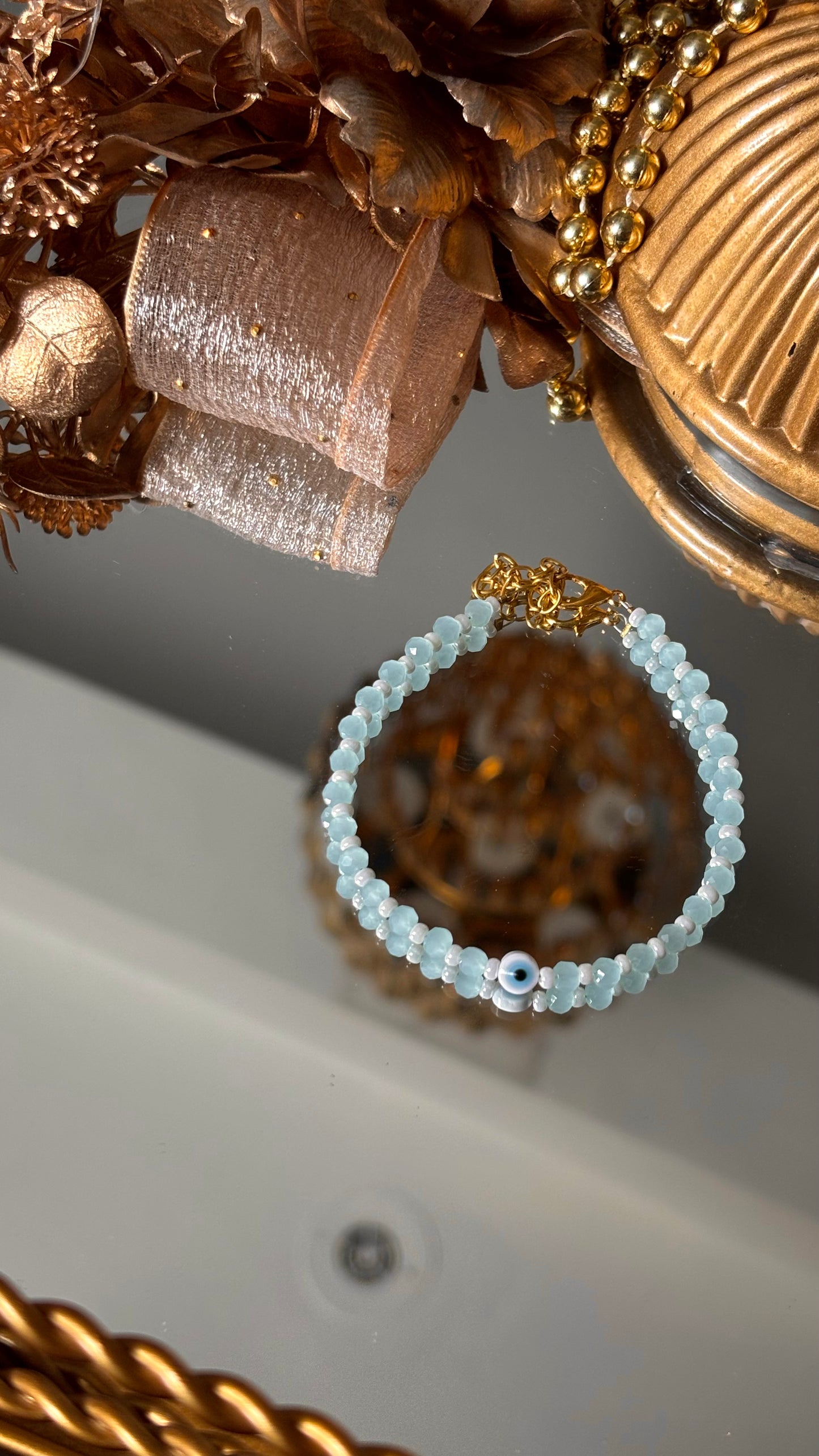 Evil eye rakhi (powder blue) (shipping will be extra )