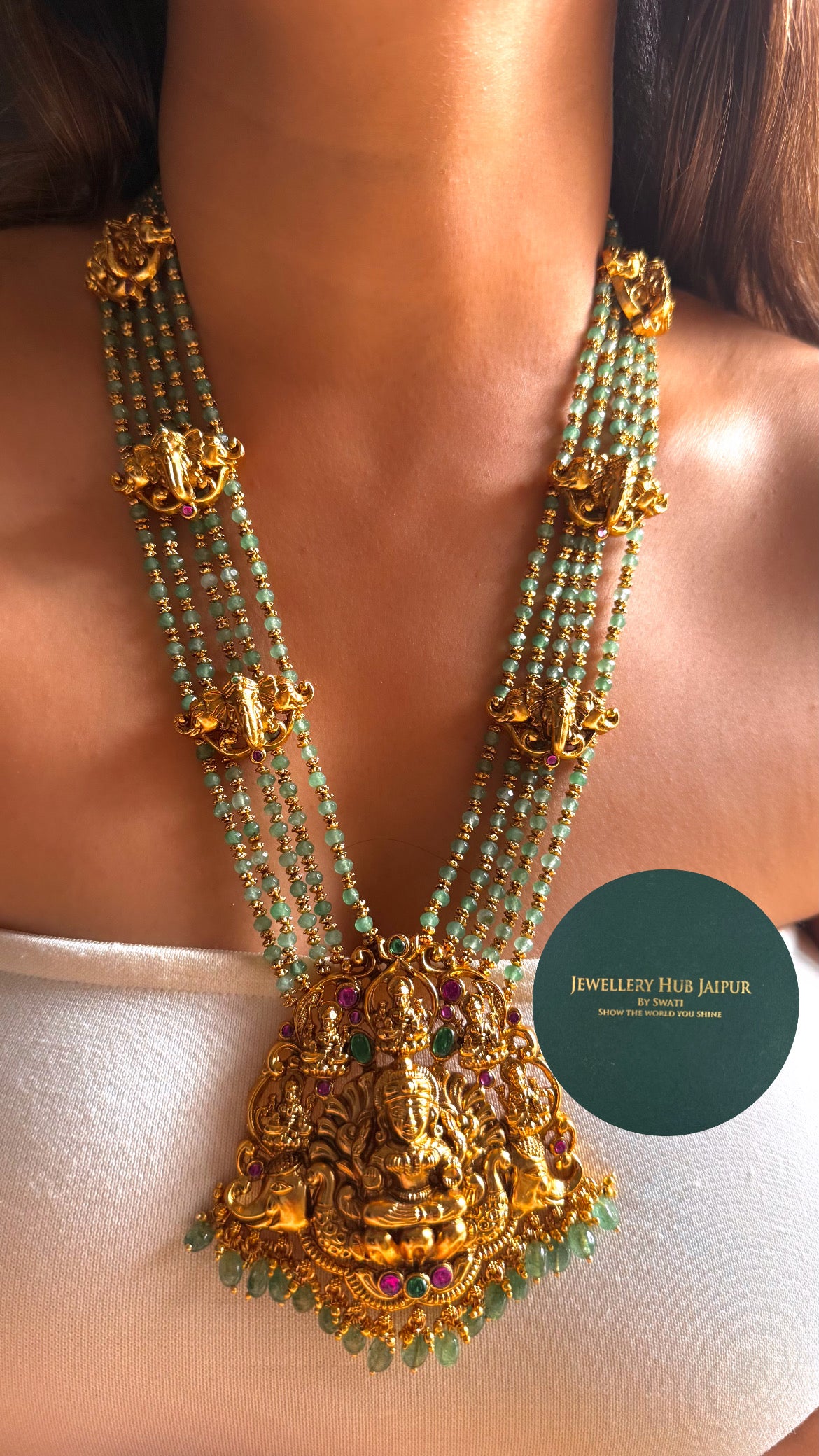 Goddess laxmi emerald & rani pink with mint string & gajj long set