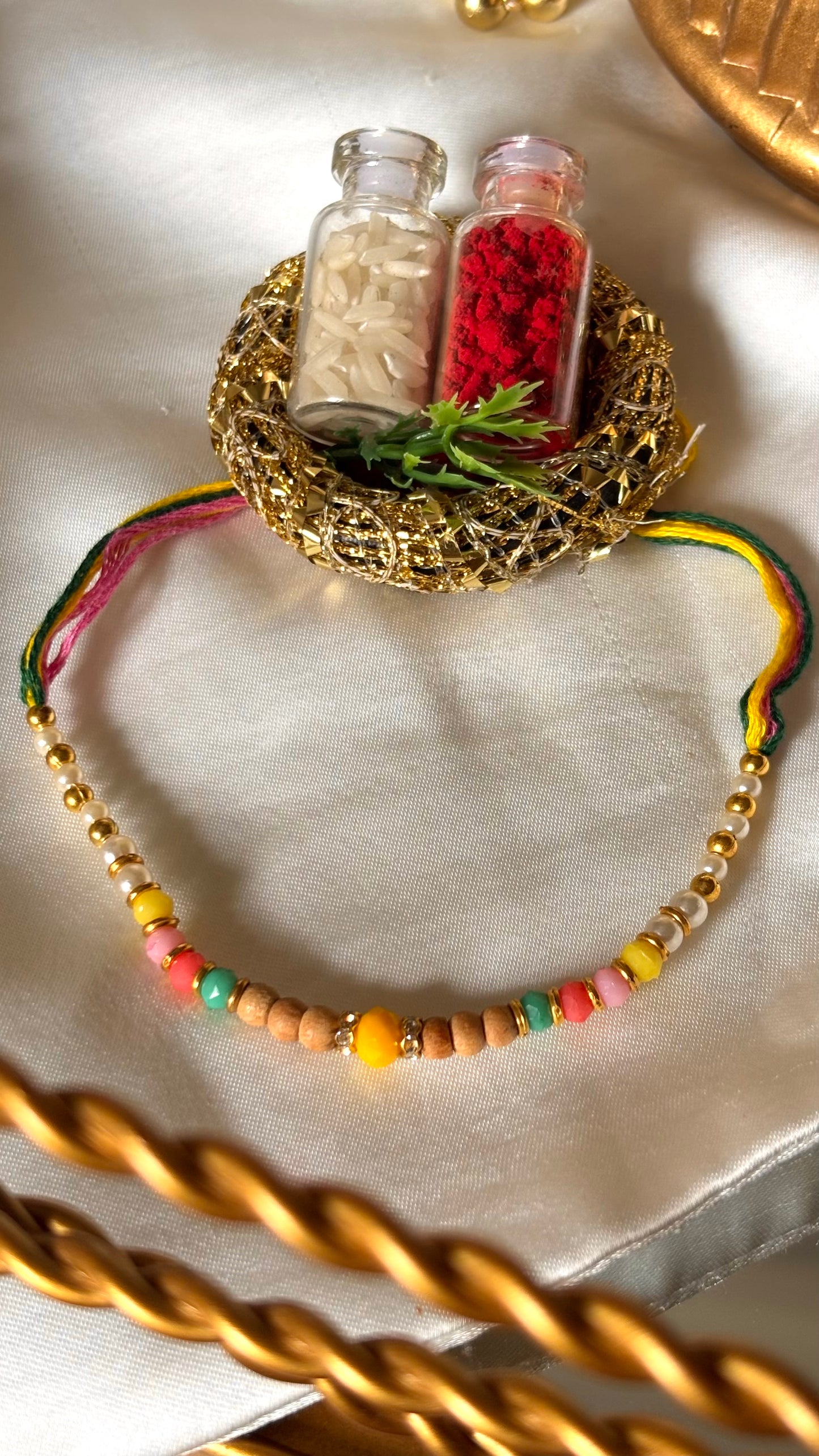 Multicoloured thread Rakhi ( shipping will be extra )