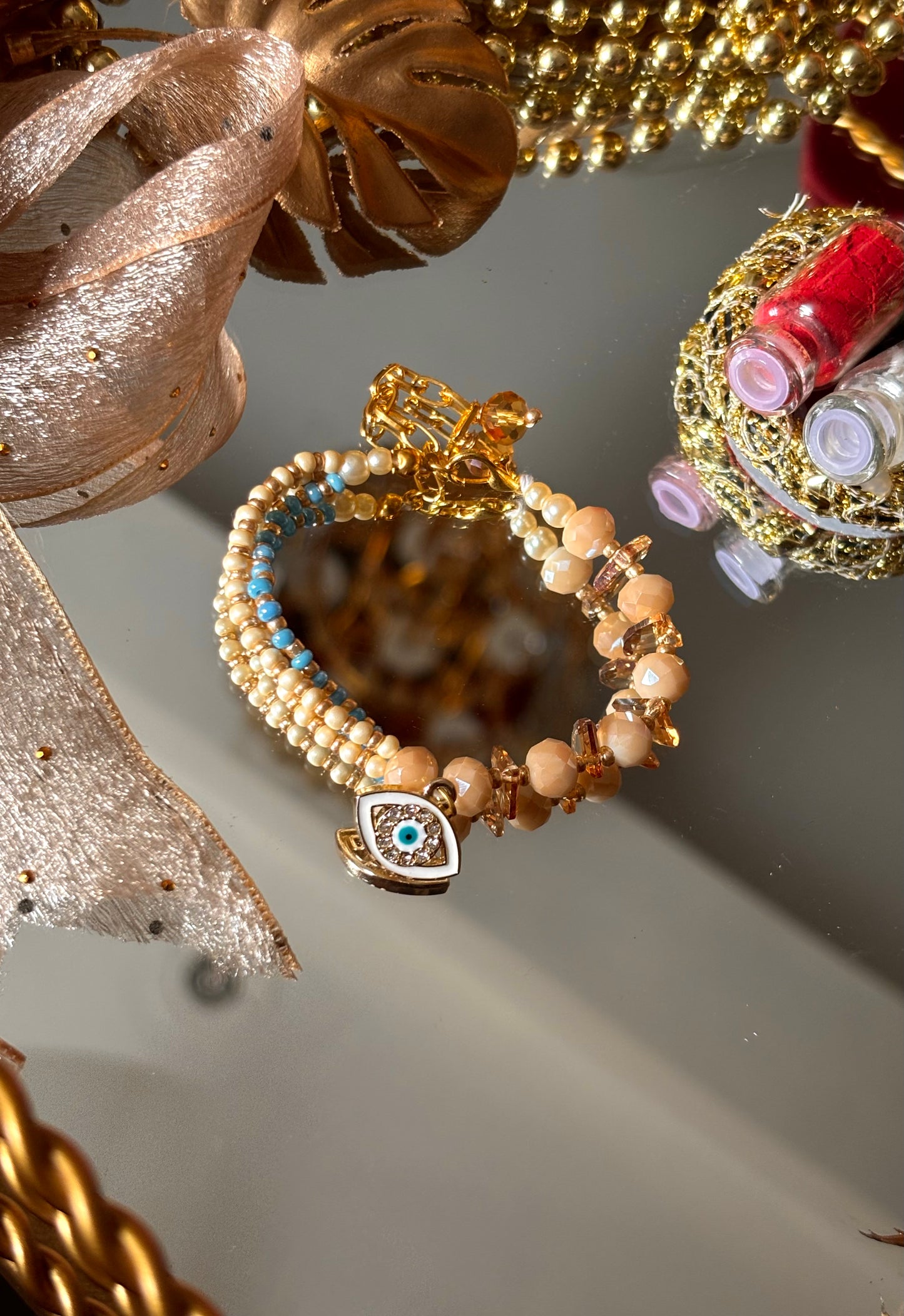 Evil eye peach & firoza designer Rakhi bracelet ( shipping will be extra )