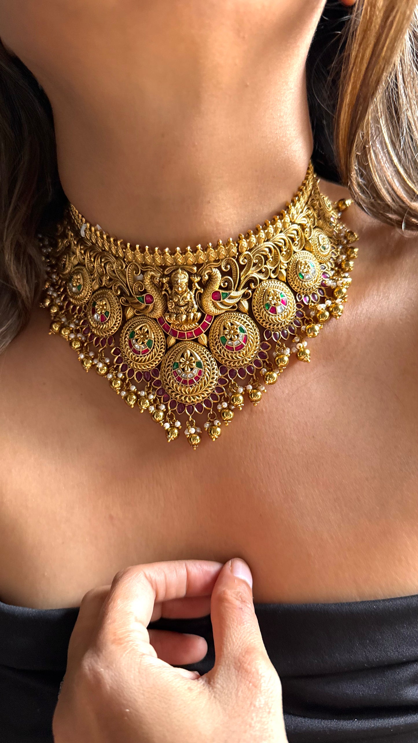 Goddess Laxmi inspired temple jewellery with peacock motif