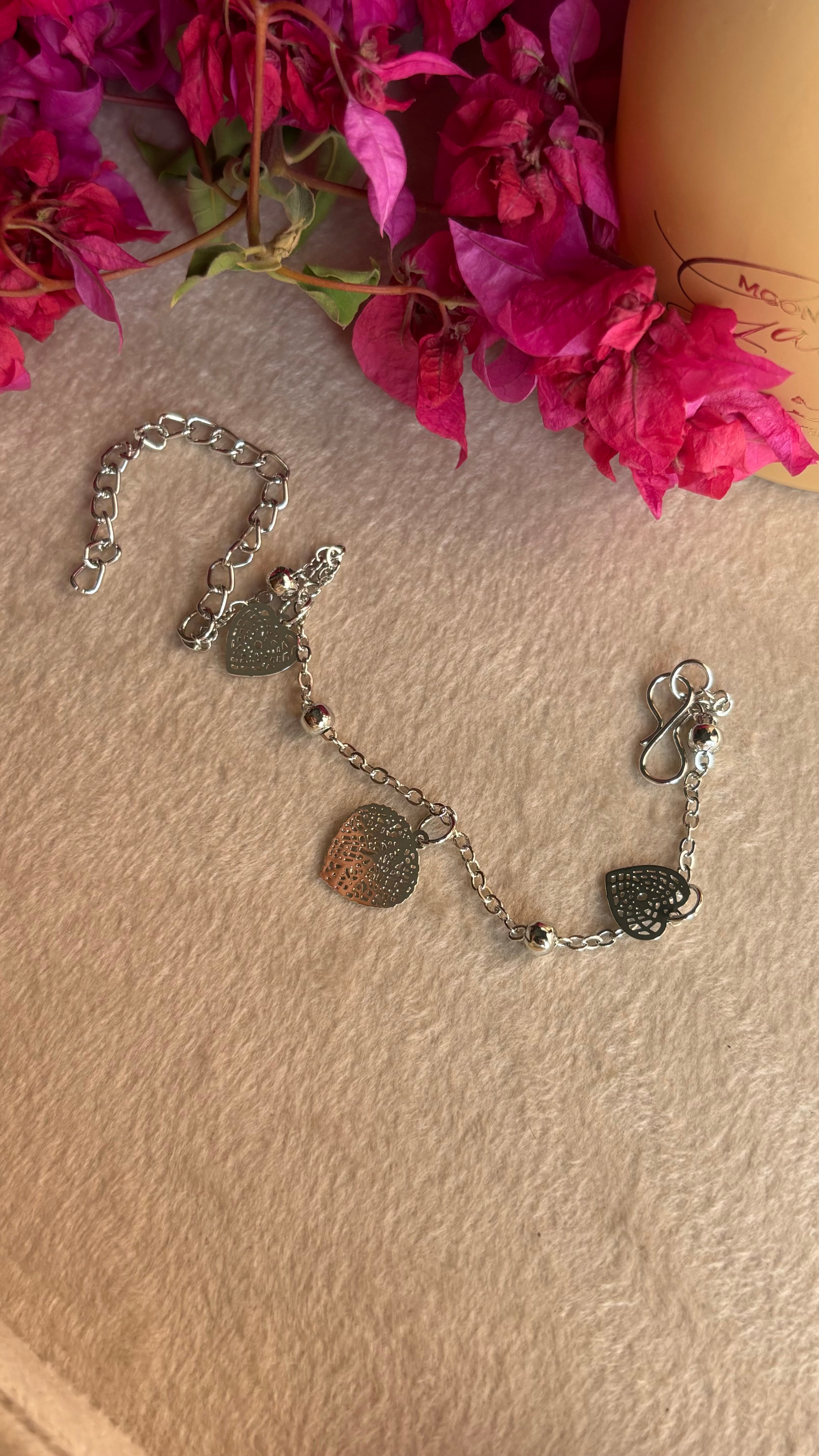 Rhodium triple heart bracelet