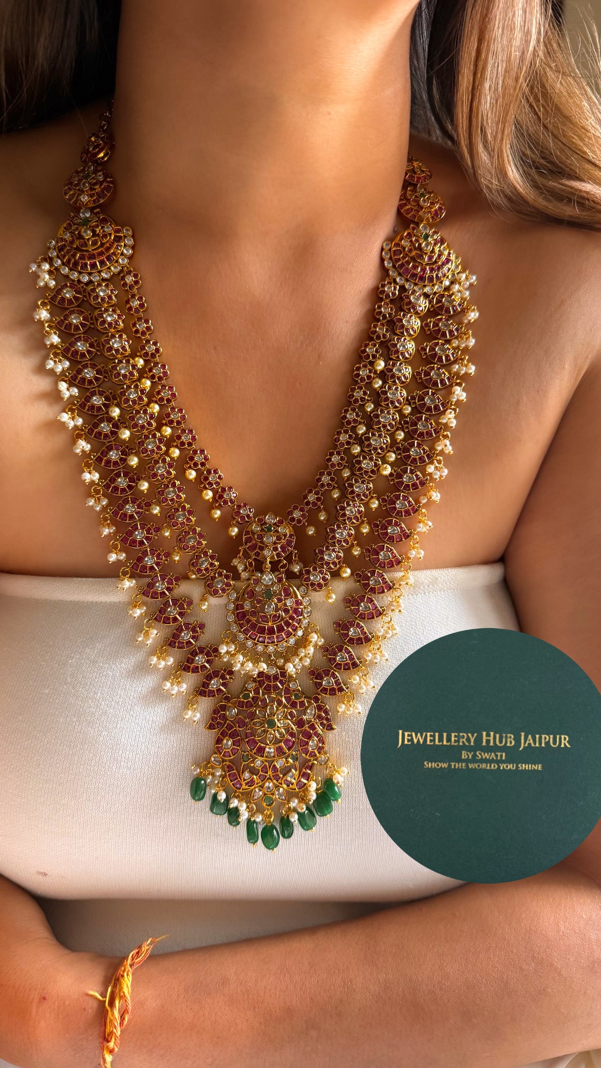 Rani pink & emerald triple layer with emerald drop temple set