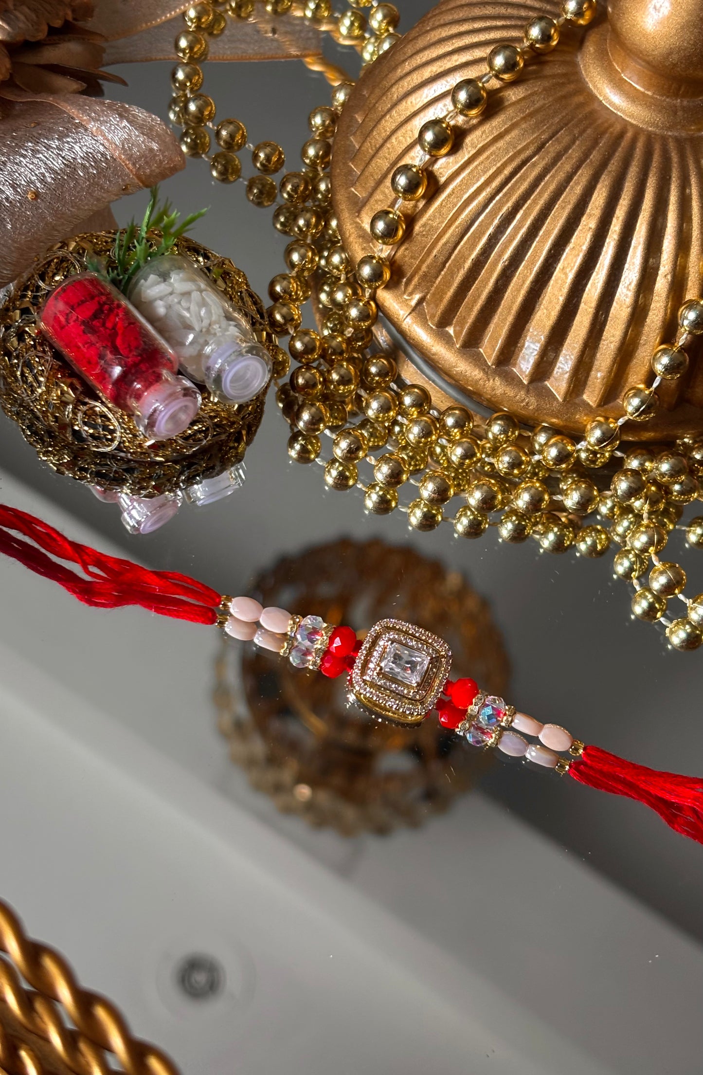 Diamond polki red rakhi ( shipping will be extra )