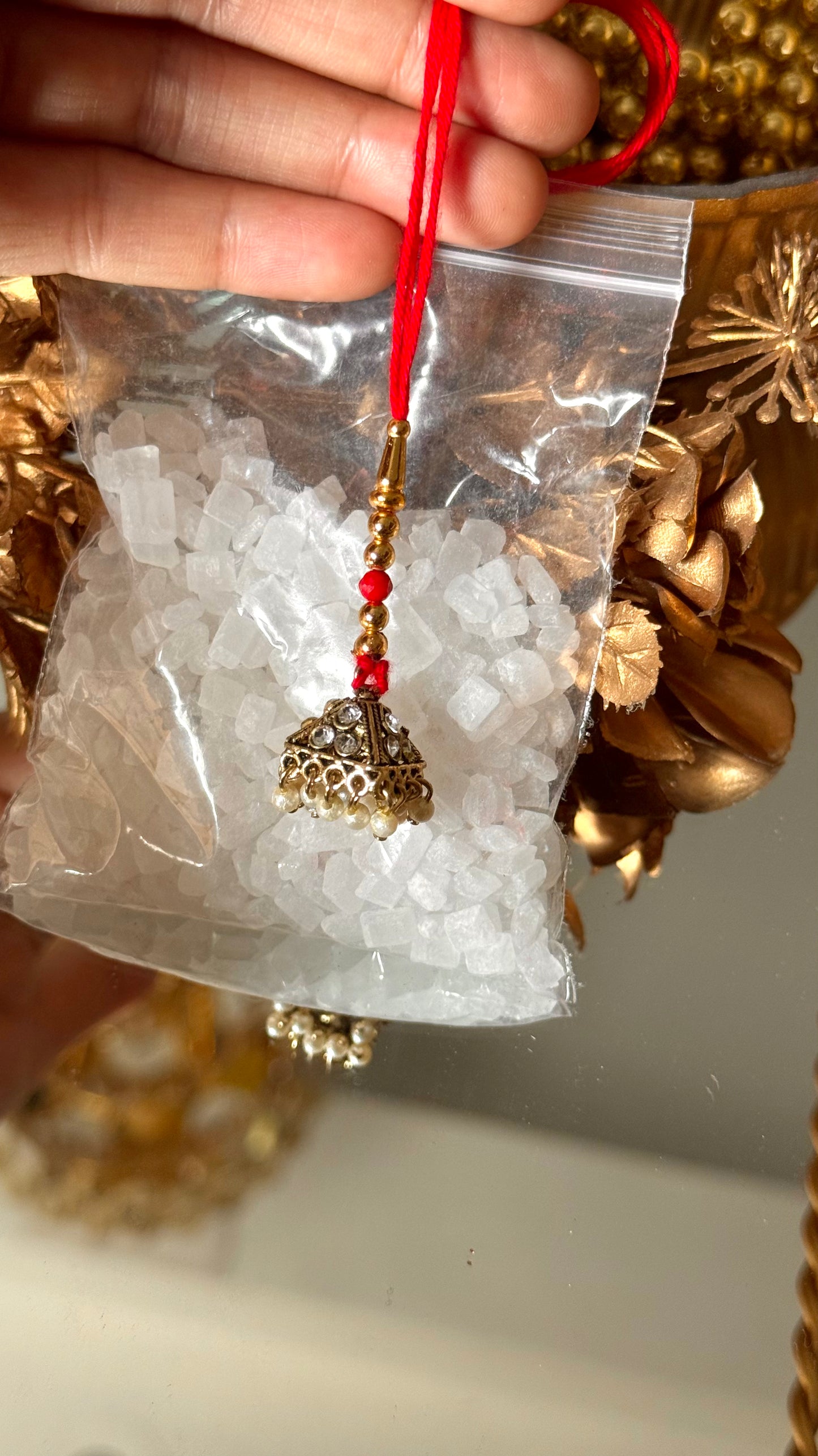 Gold jhumki rakhi